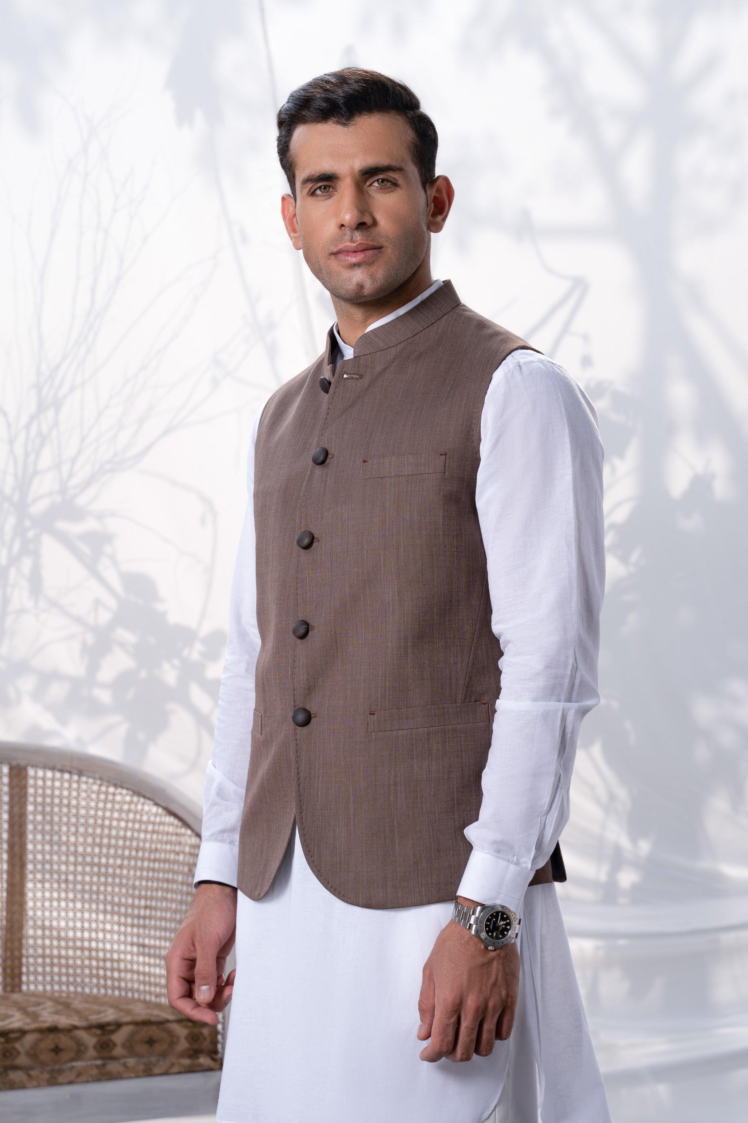 Brown waistcoat with four-button front and stand collar, over a white shirt