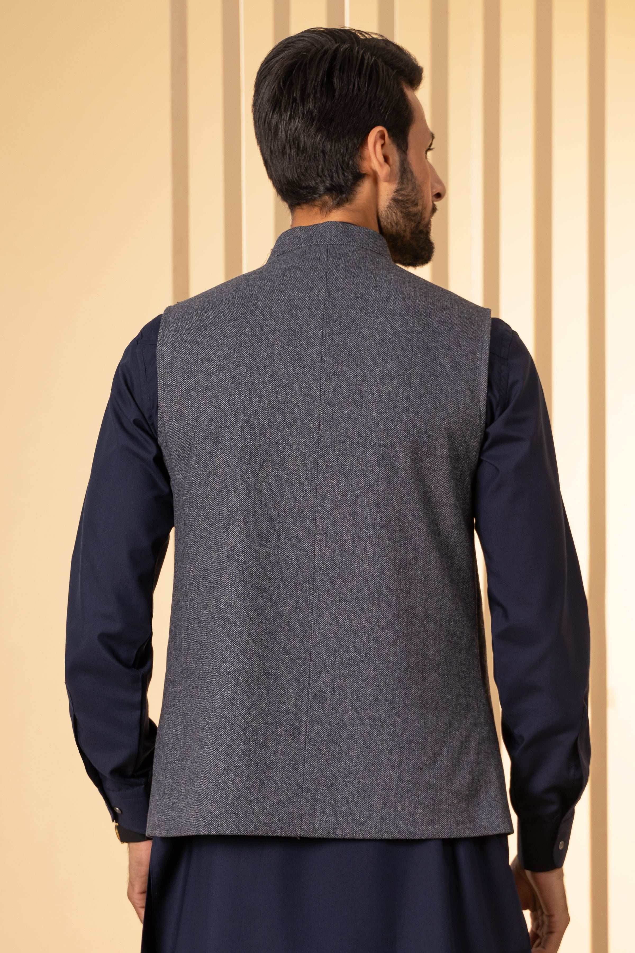 Grey herringbone waistcoat back view with stand collar