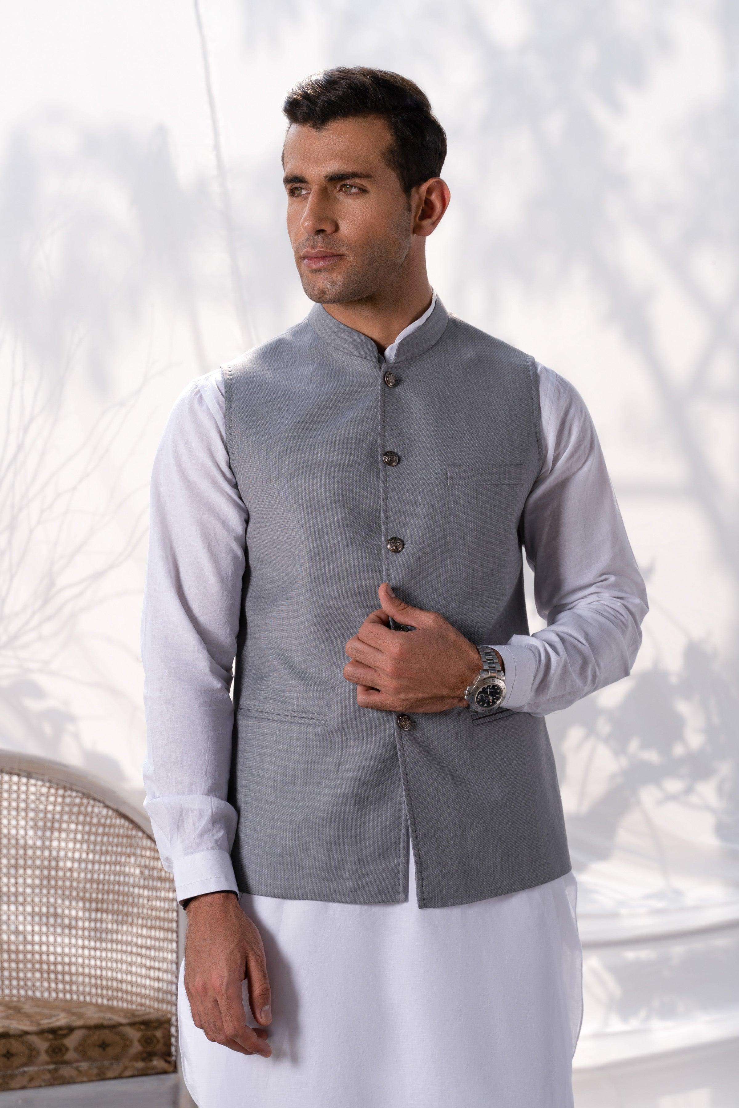 Light grey waistcoat with front buttons and welt side pocket detail