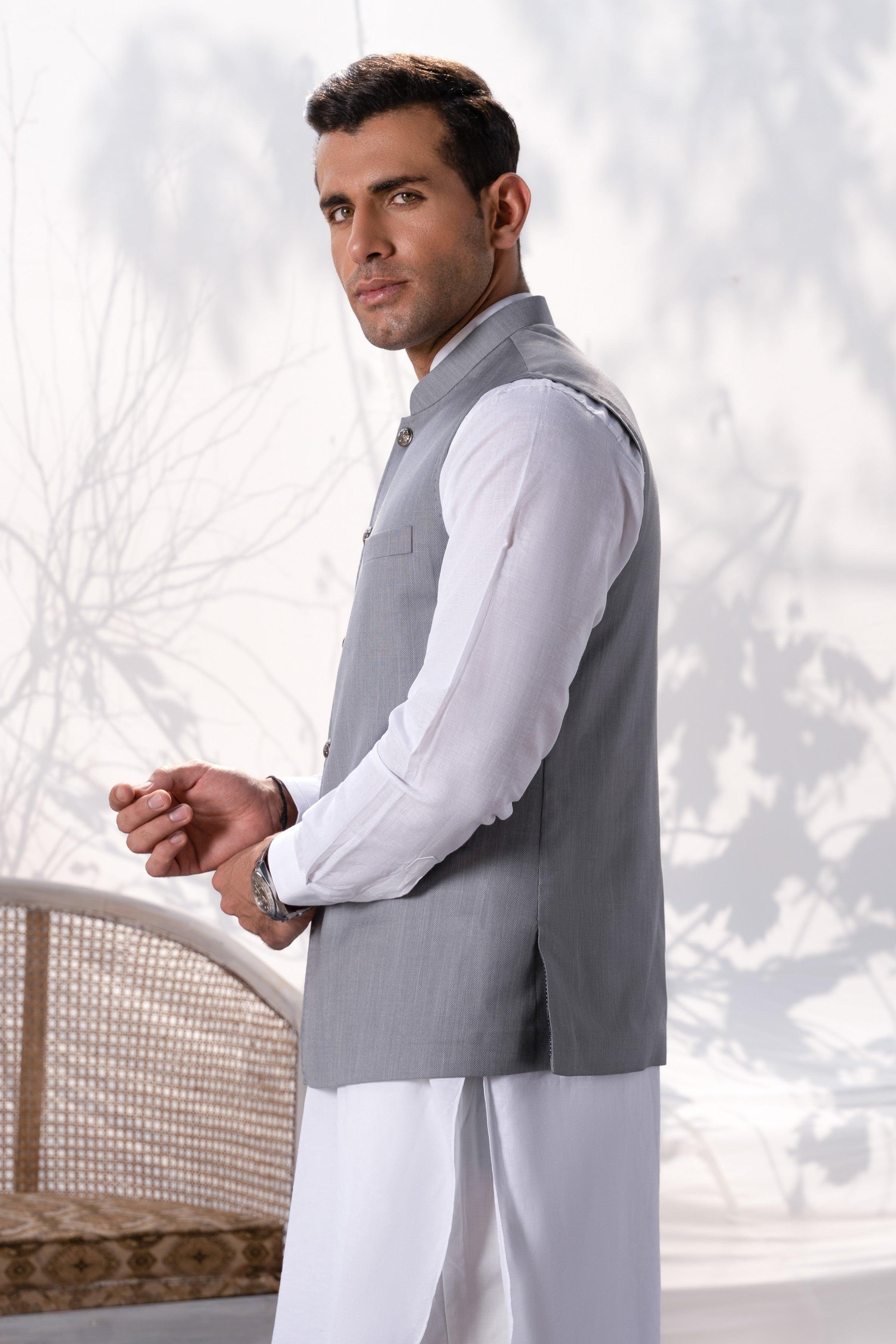 Light grey sleeveless waistcoat with stand collar and front buttons, side view