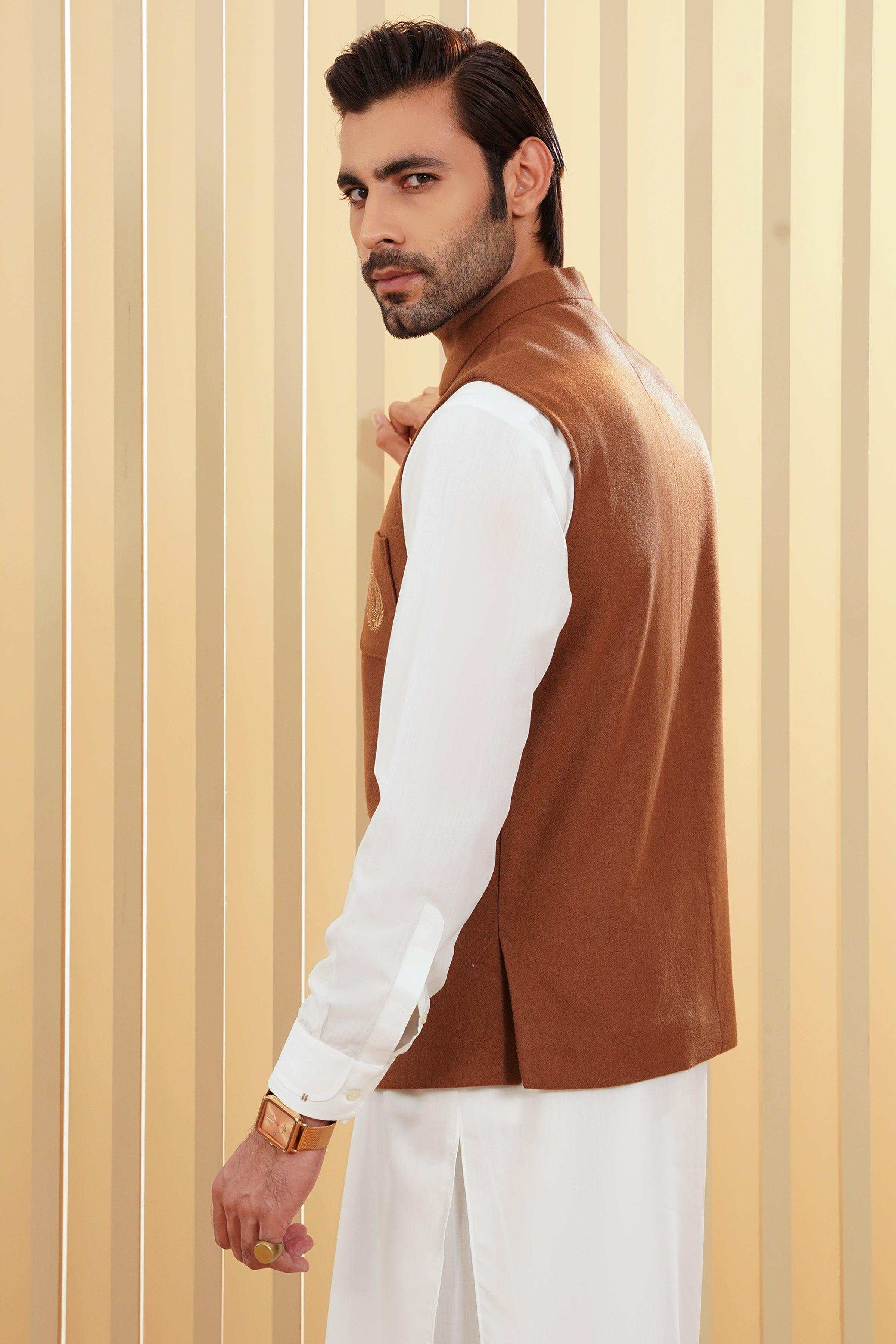 Brown waistcoat vest sleeveless layering piece, front view over white shirt