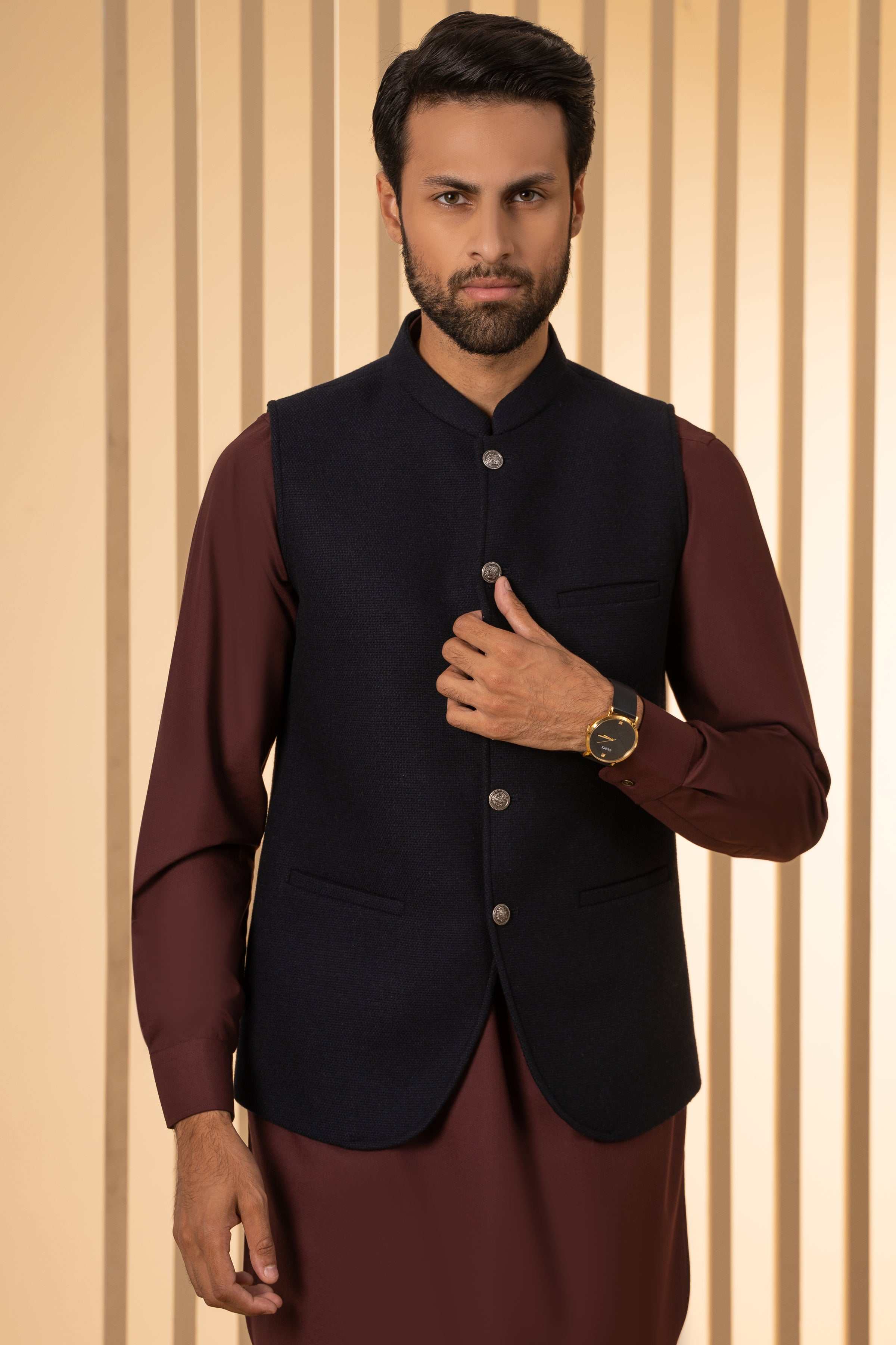 Men's dark navy waistcoat front view with stand collar and buttoned closure