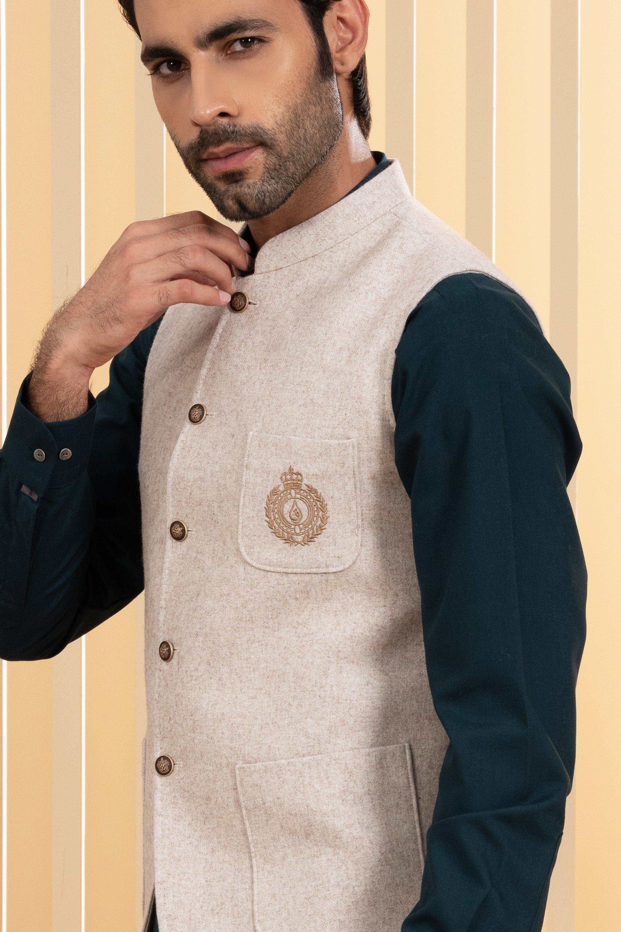 Oatmeal waistcoat close-up: stand collar, button placket and chest emblem