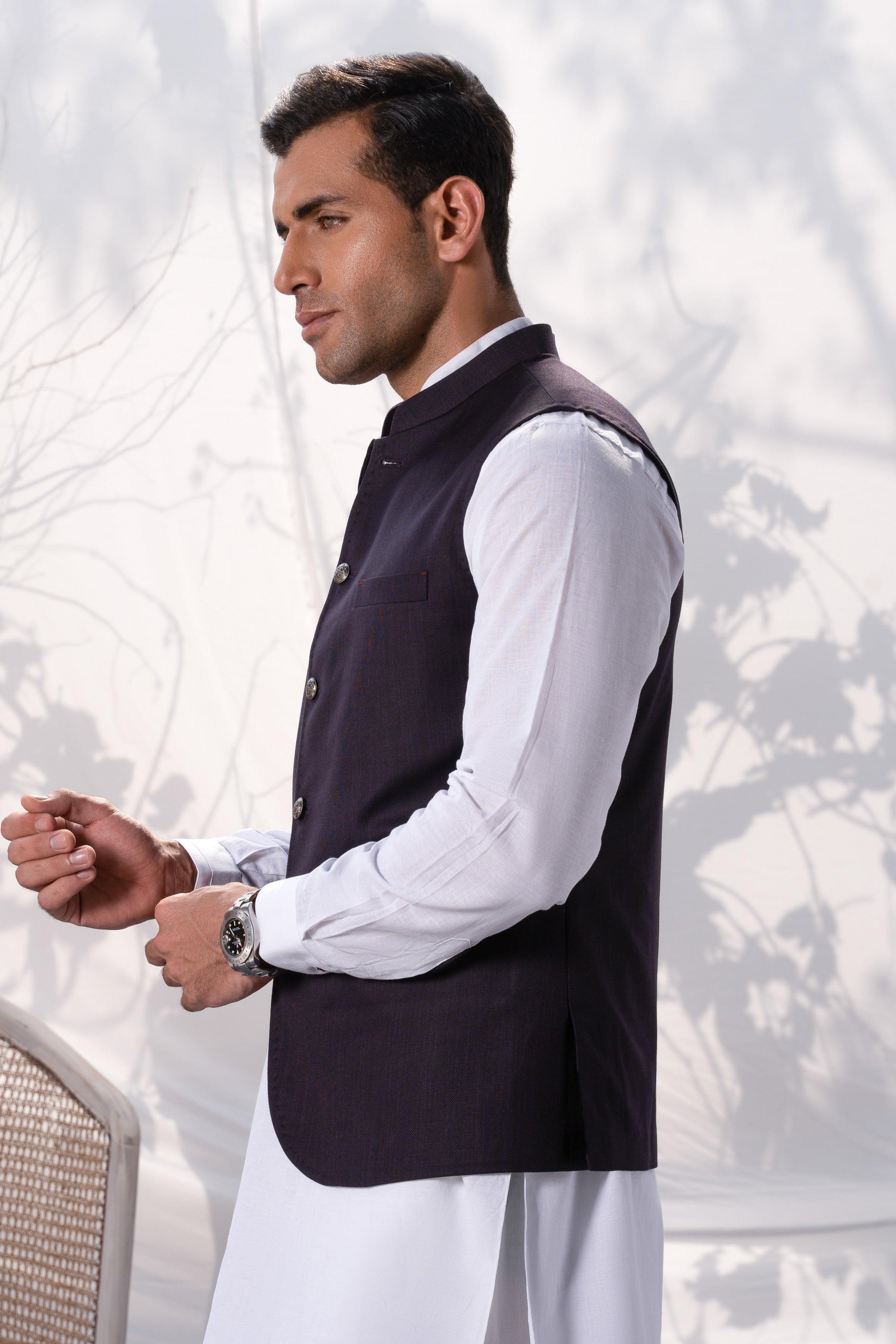 Plum waistcoat with front buttons and welt pocket, worn over white shirt