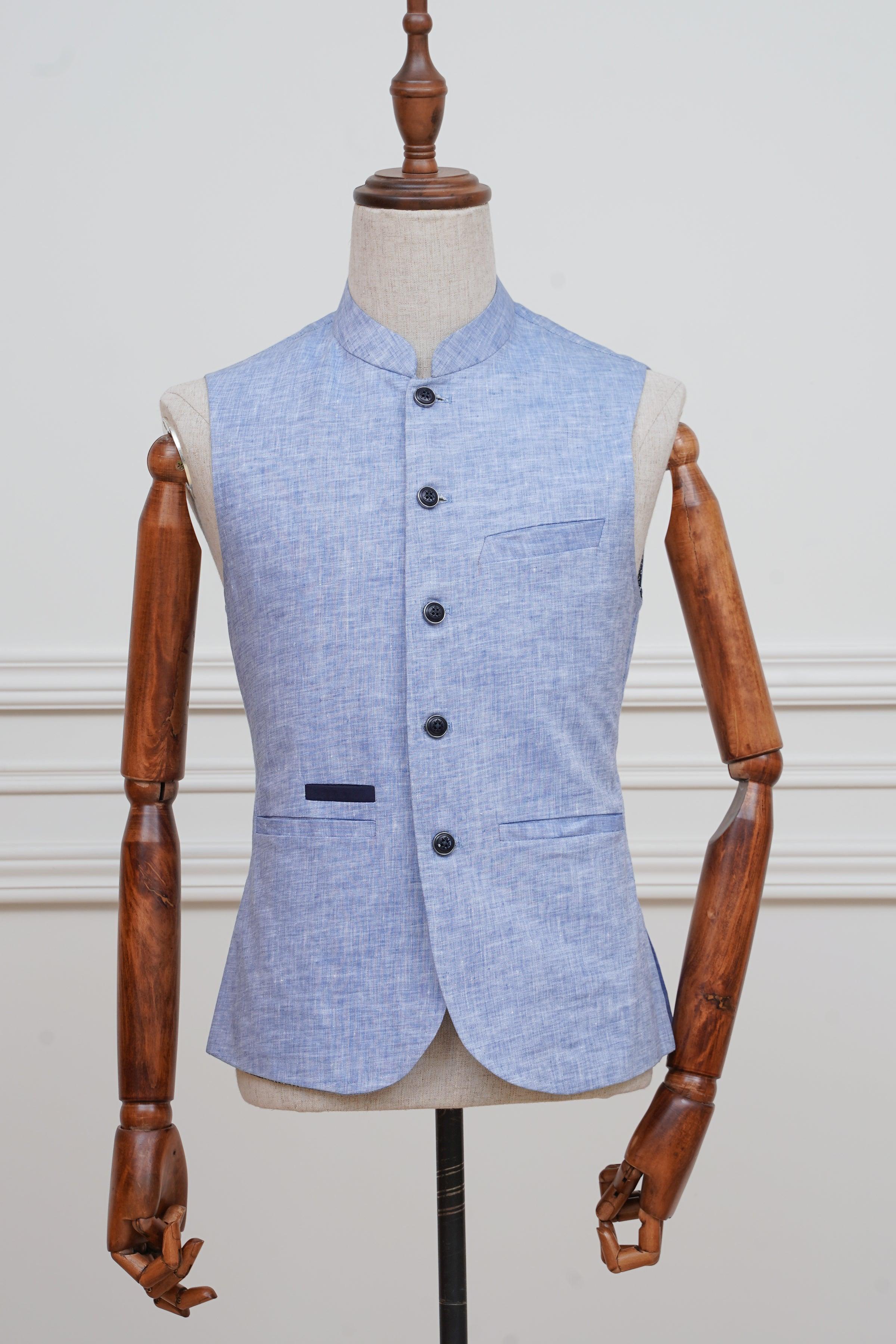 Sky blue waistcoat with stand collar, button front, and welt pocket detail