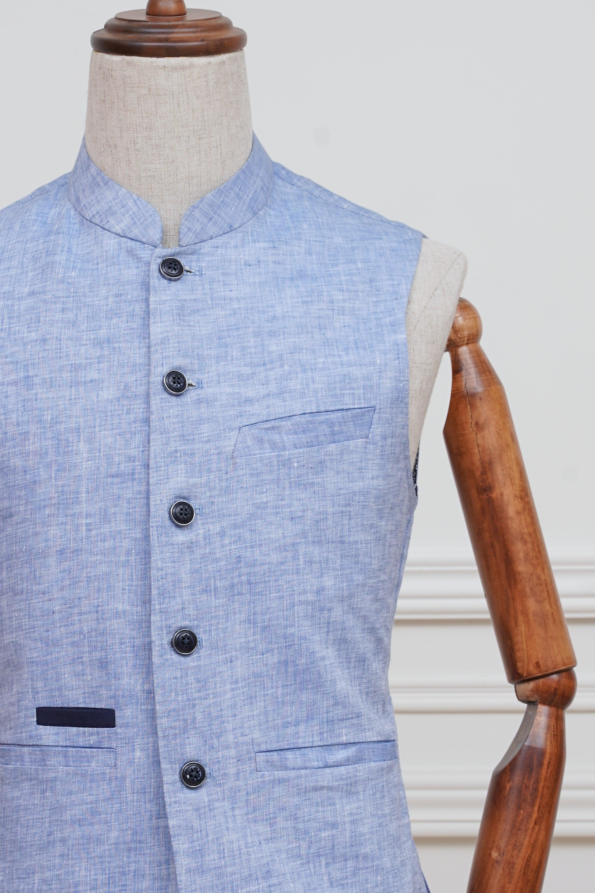 Sky blue waistcoat close-up with stand collar, dark buttons, and chest pocket