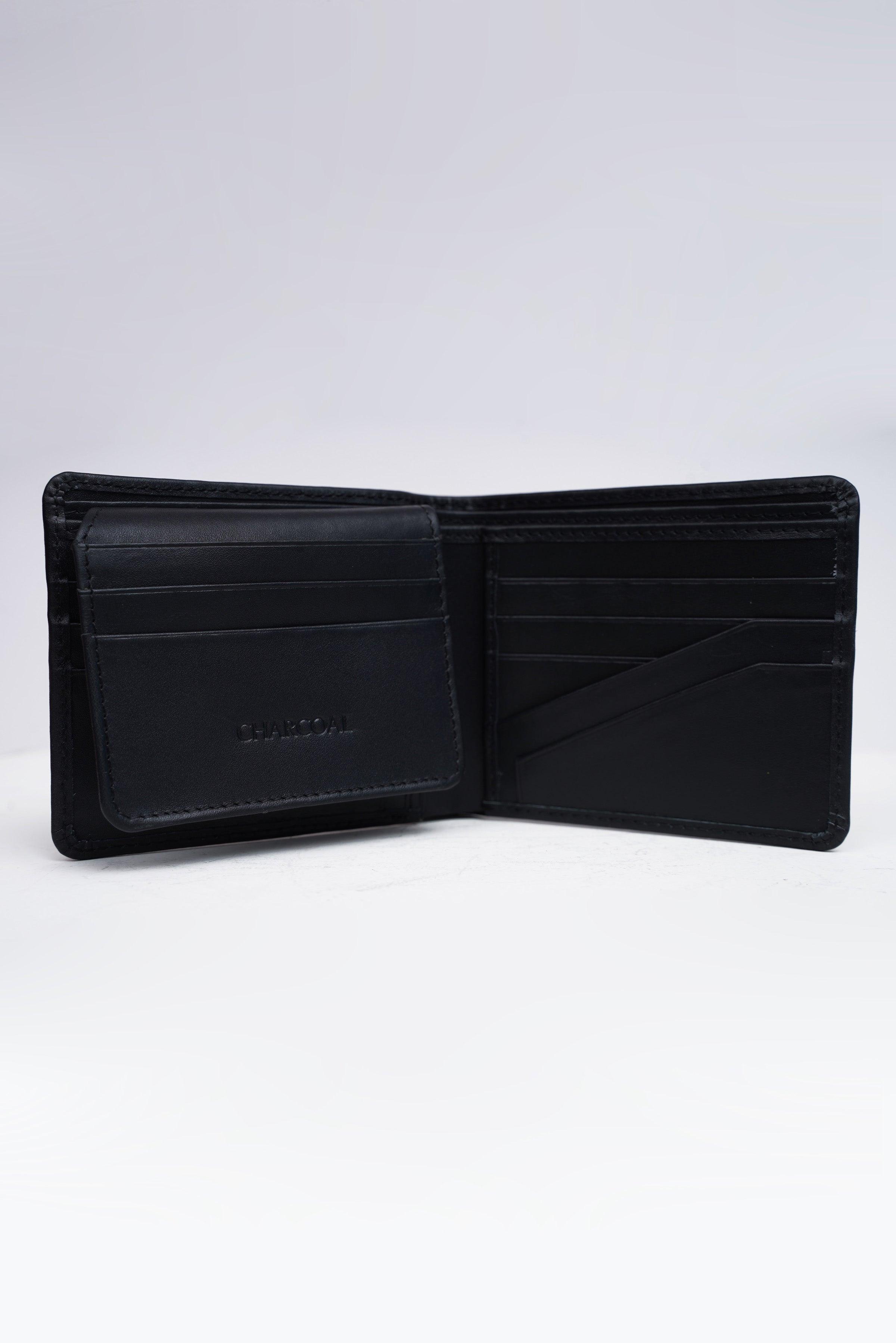 Black wallet open, showing card slots and bill compartment