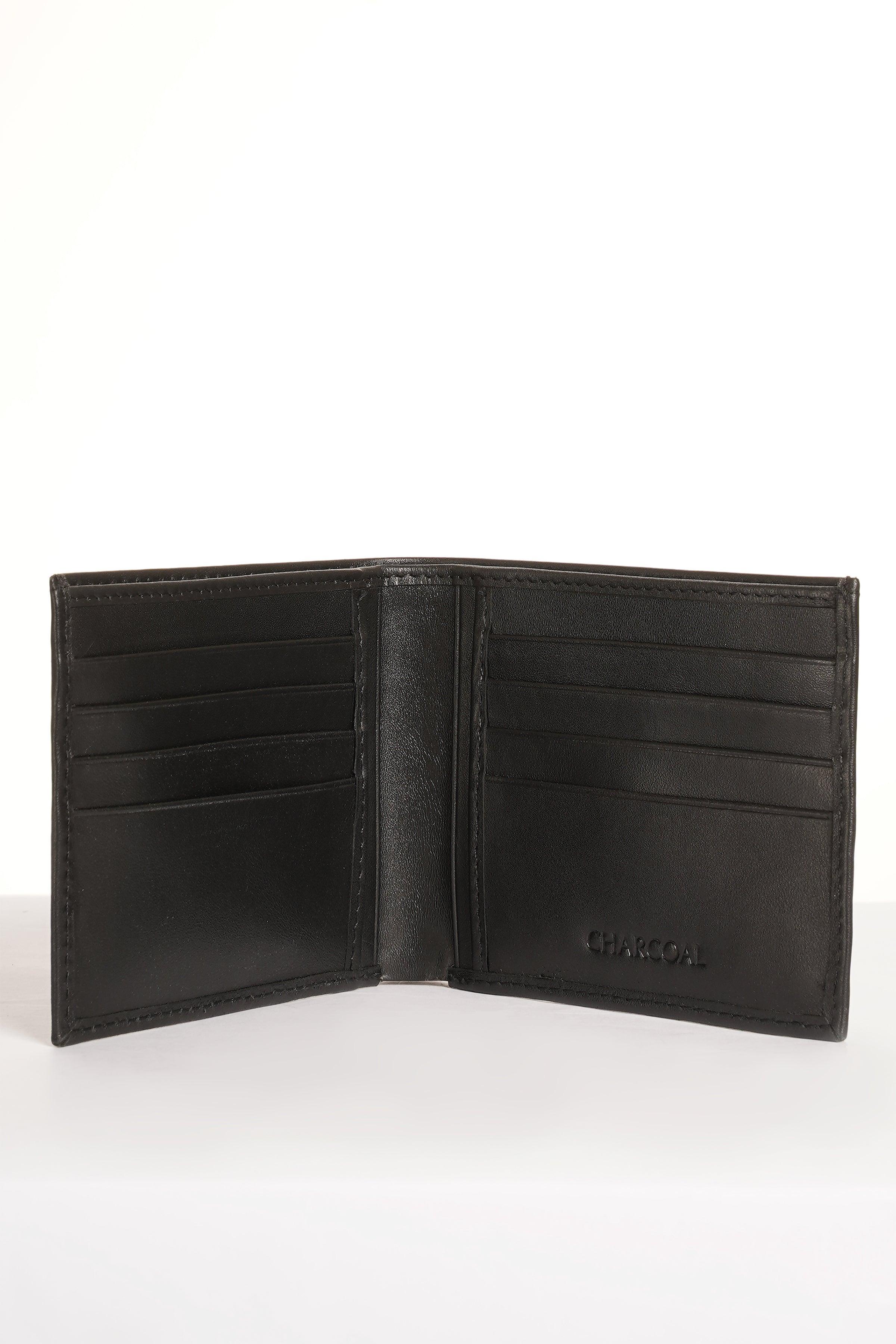 Black bifold wallet opened, showing multiple card slots