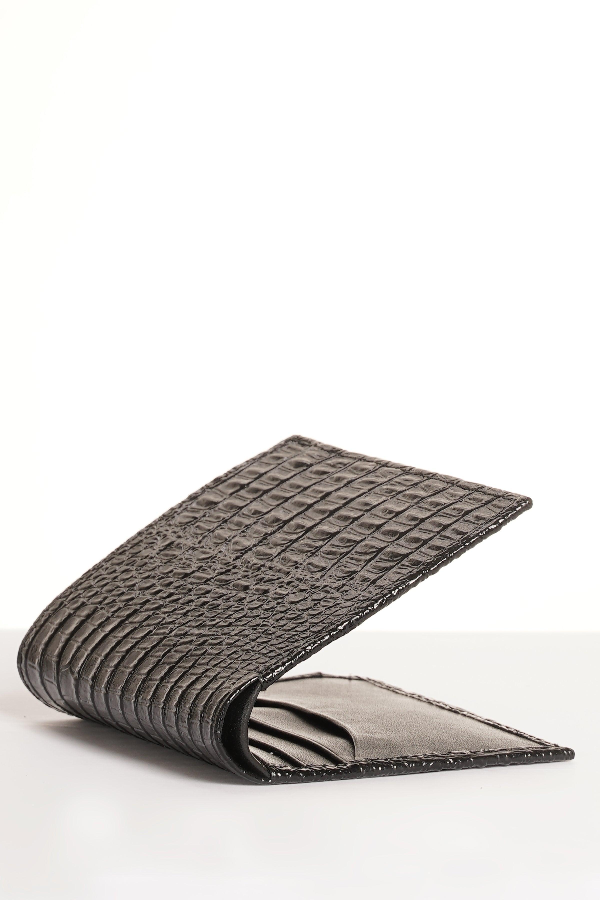 Black croc-textured wallet, open compartment side view