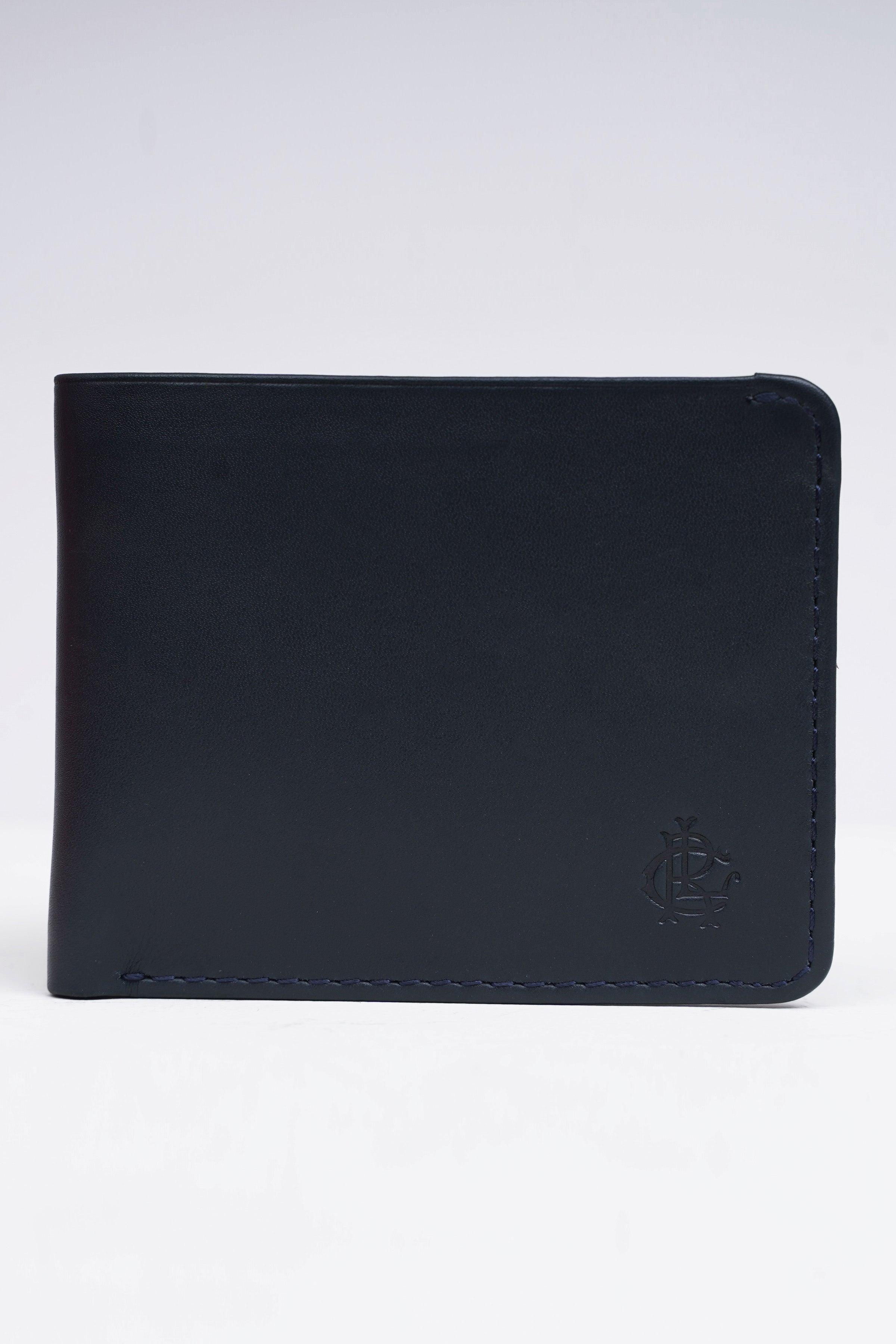 Bifold leather wallet in dark blue with stitched edges and embossed crest logo