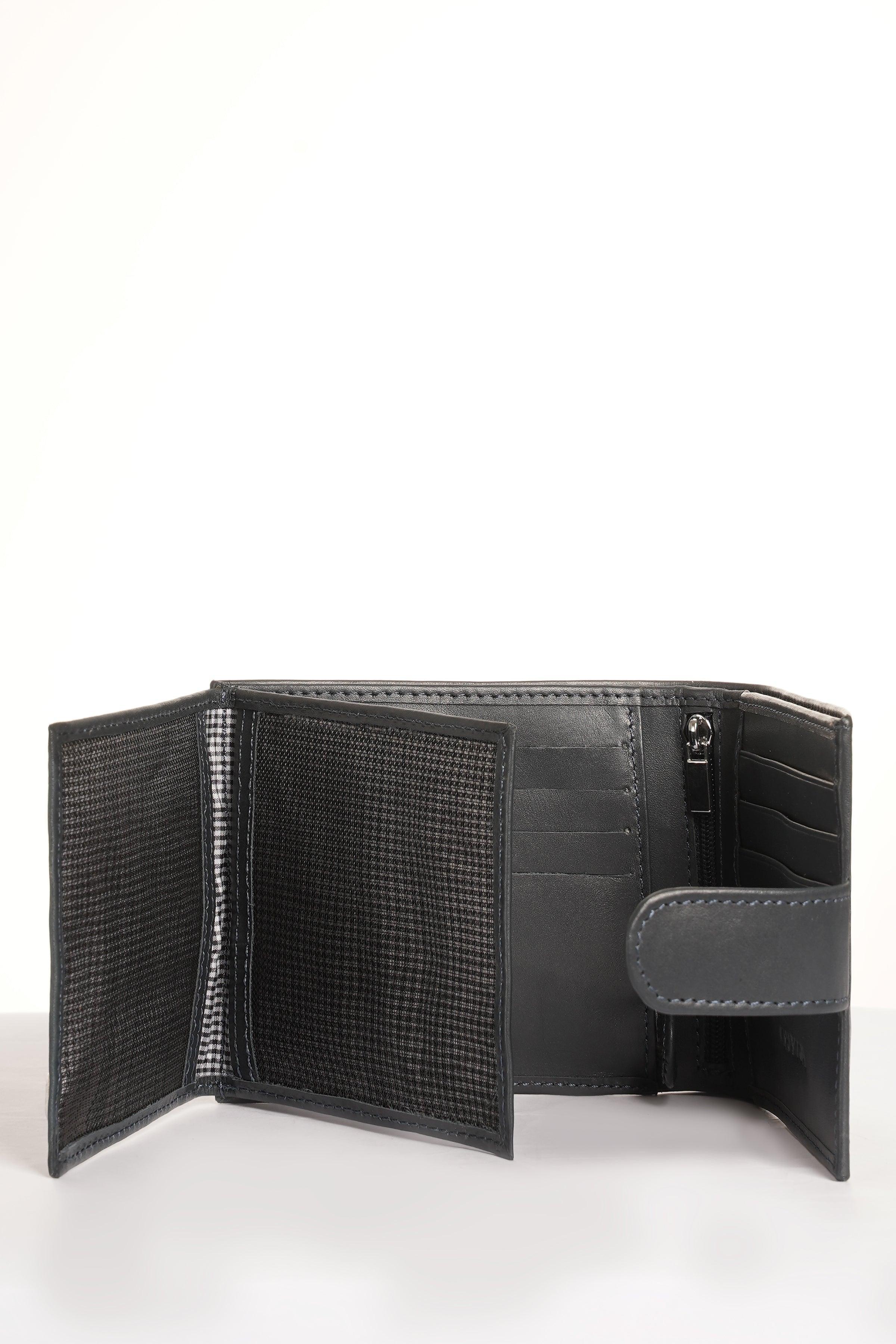 Dark leather bifold wallet interior with zipper pocket and card holders