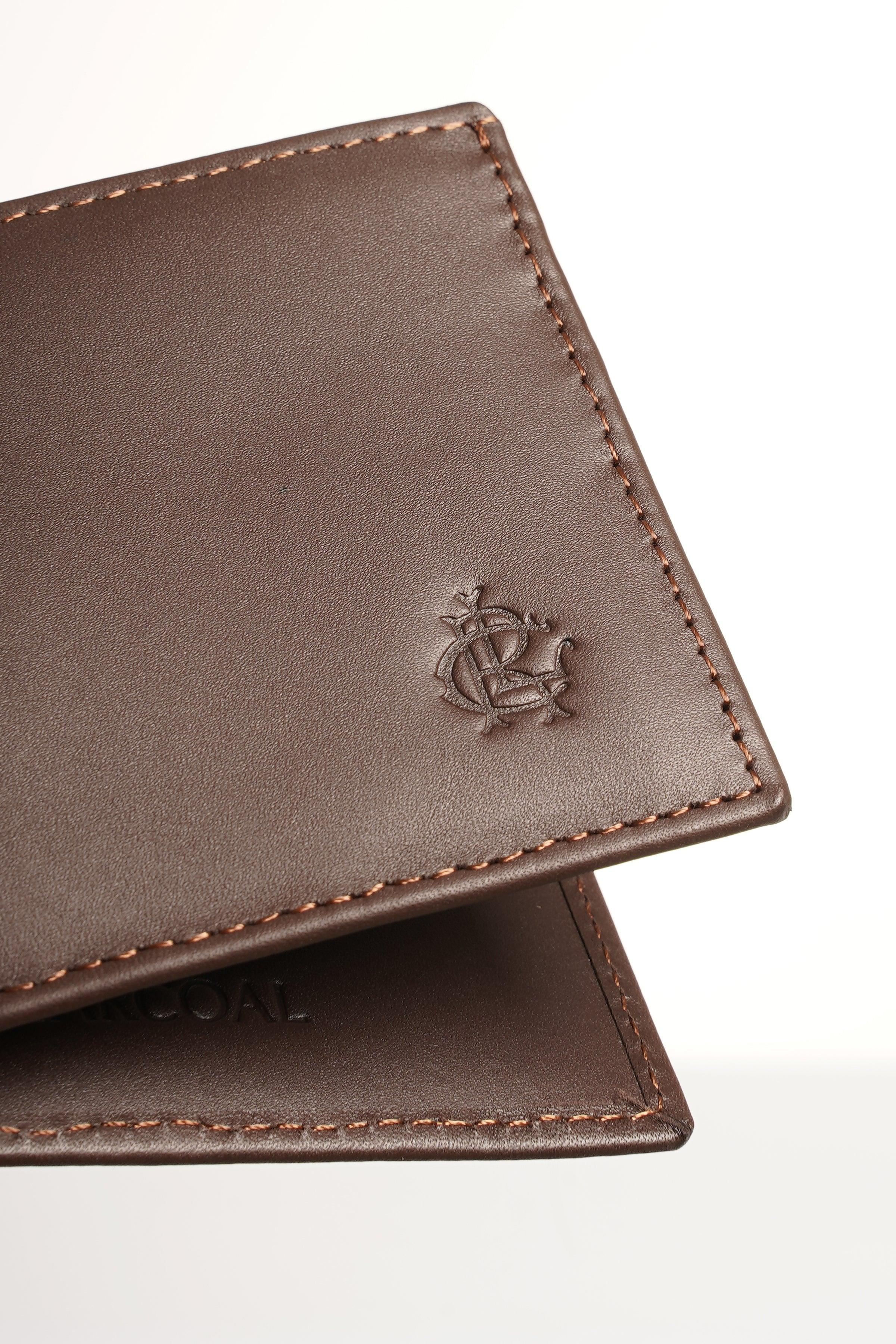 Brown leather wallet with embossed logo and stitched edge