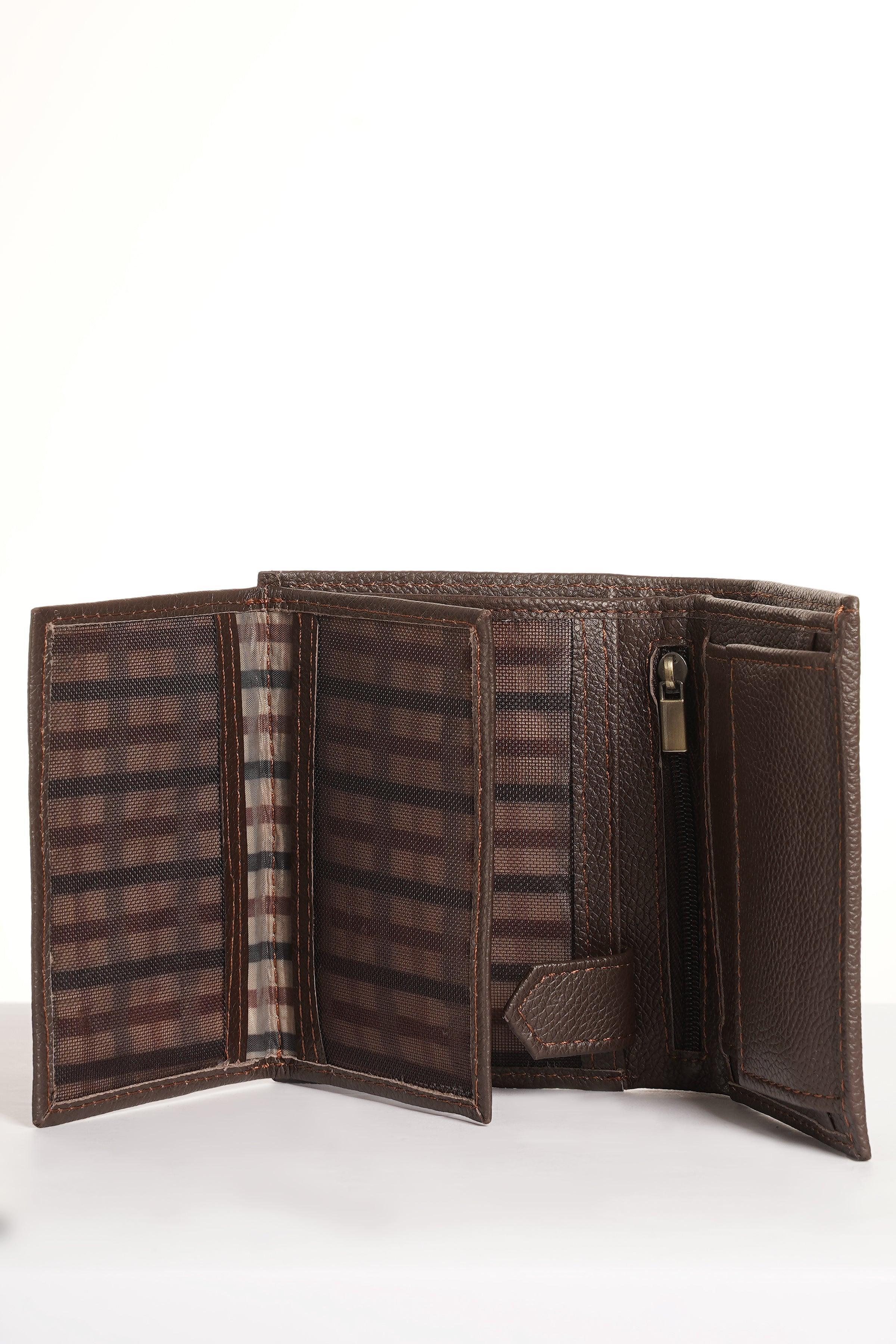 Brown leather wallet open with bill compartment and card slots