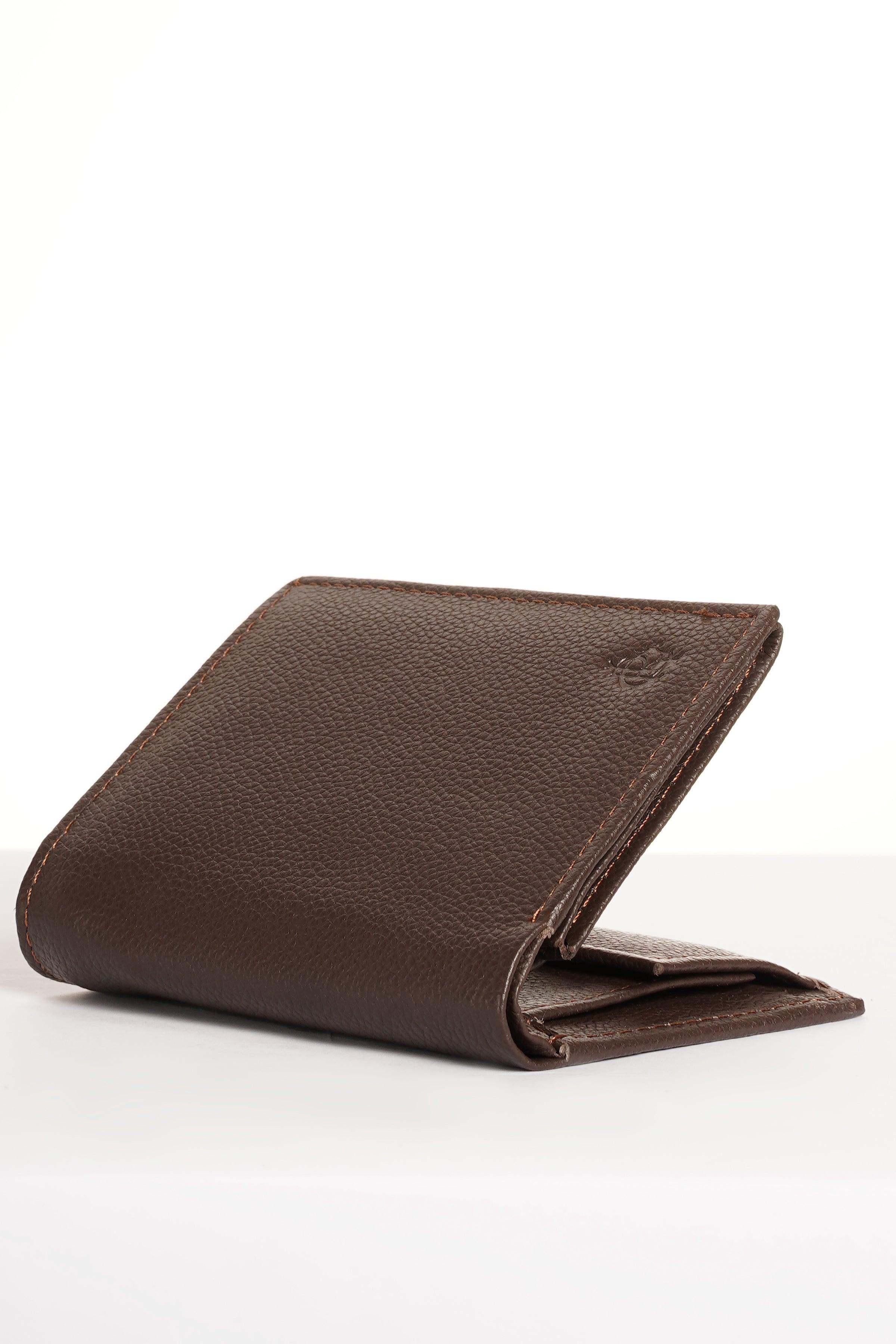 Brown leather wallet, side profile view