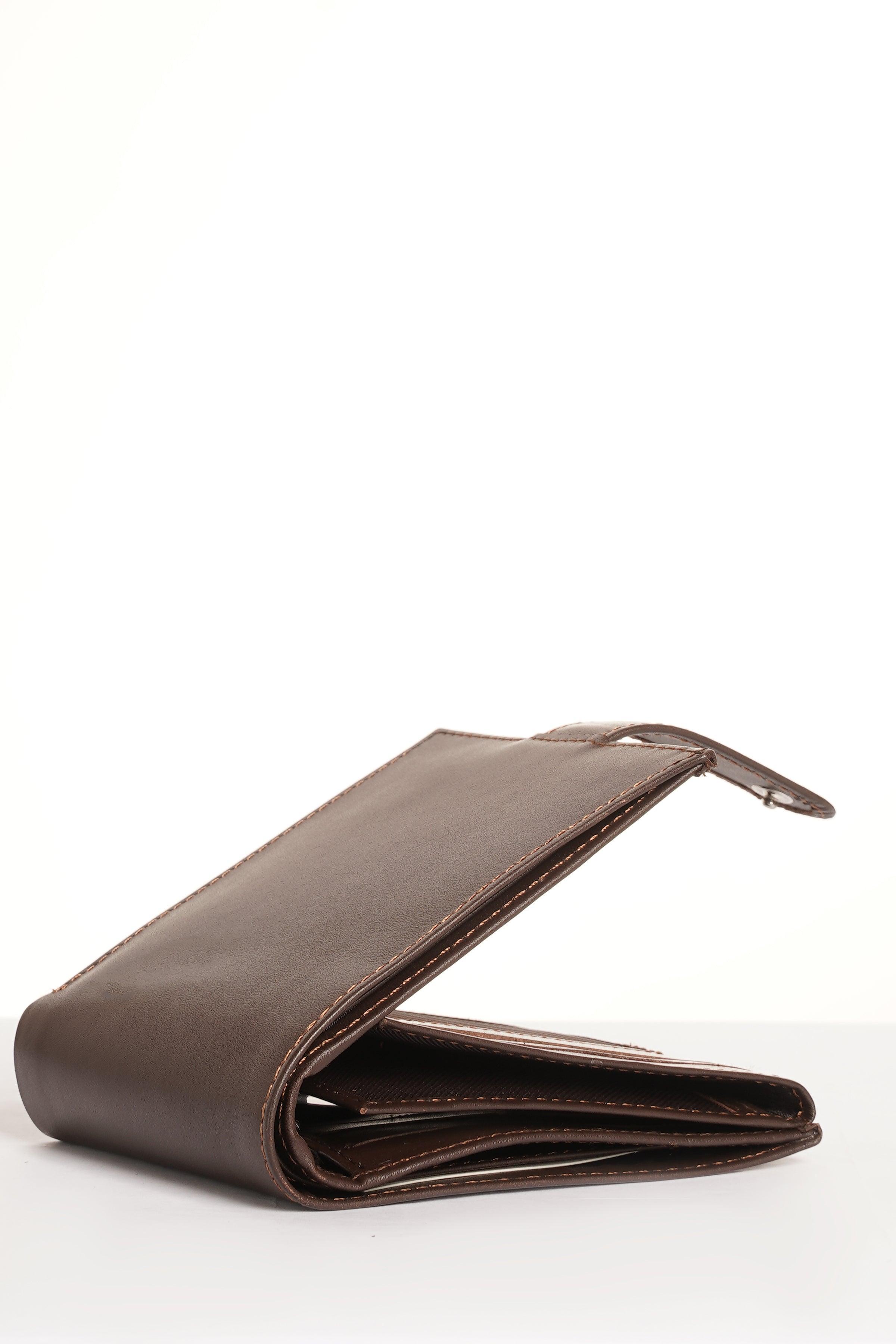 Brown leather slim bifold wallet folded, side view