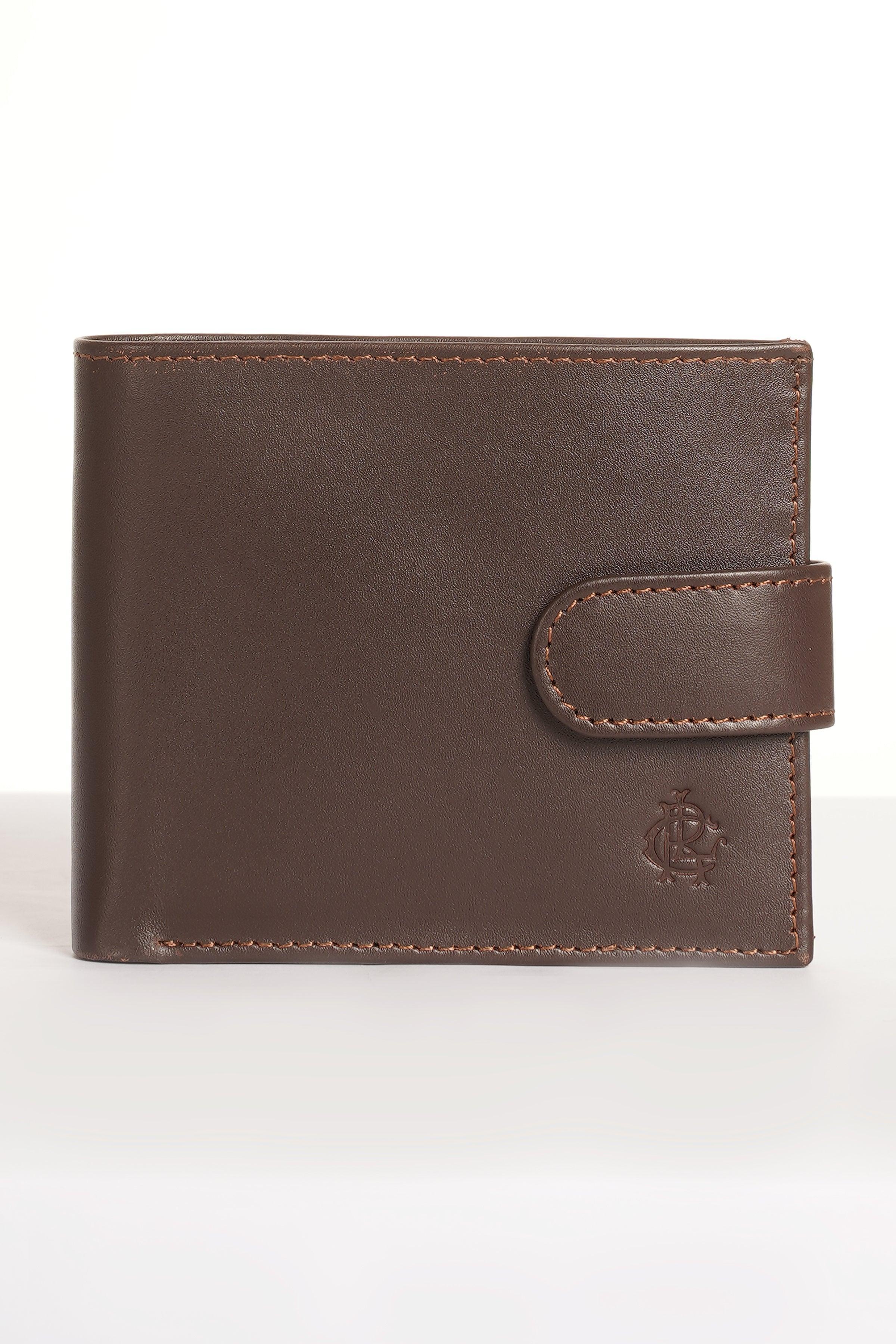 Brown leather bifold wallet with stitched edges and front snap pocket