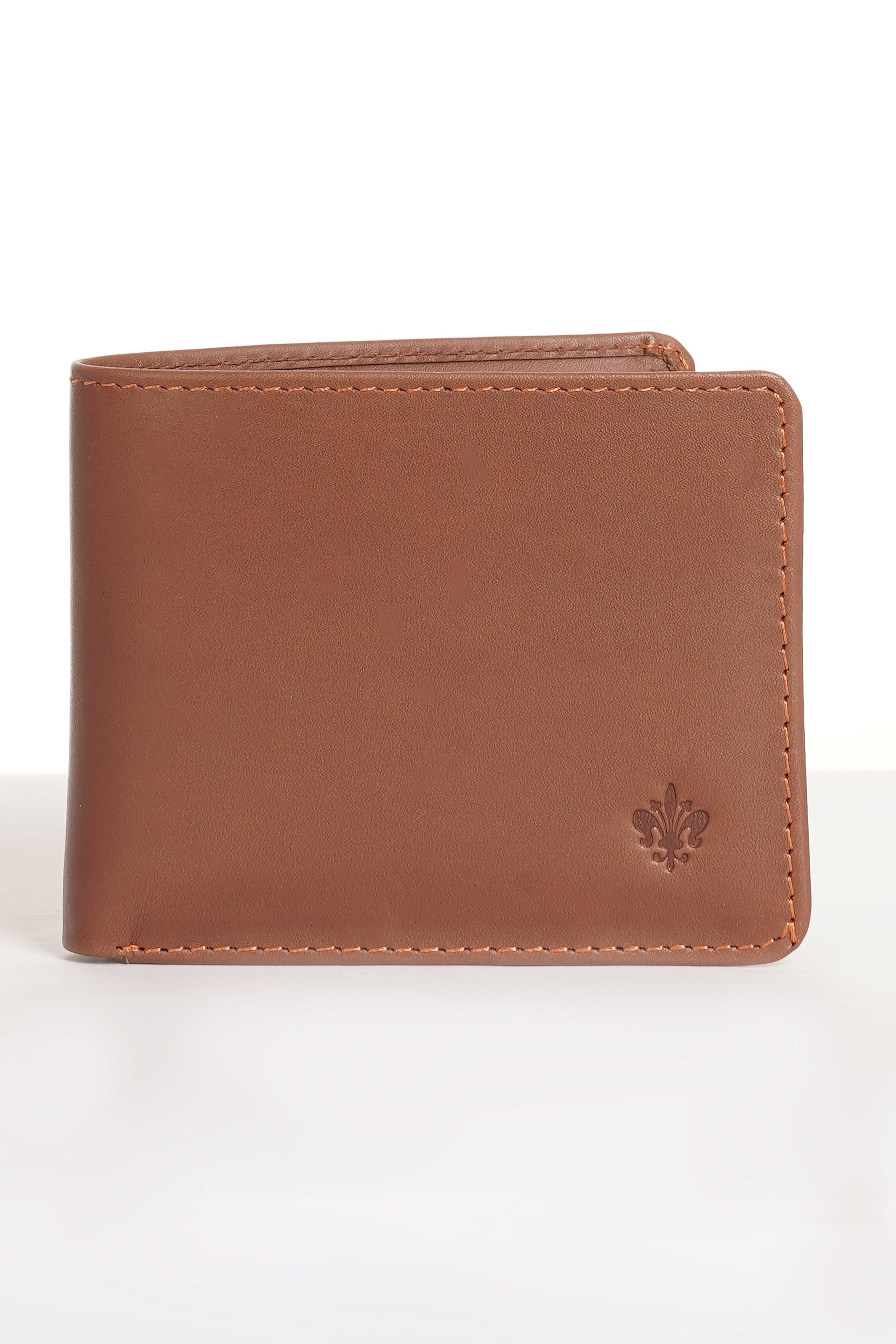 Tan bifold wallet with stitched edges and small leaf emblem