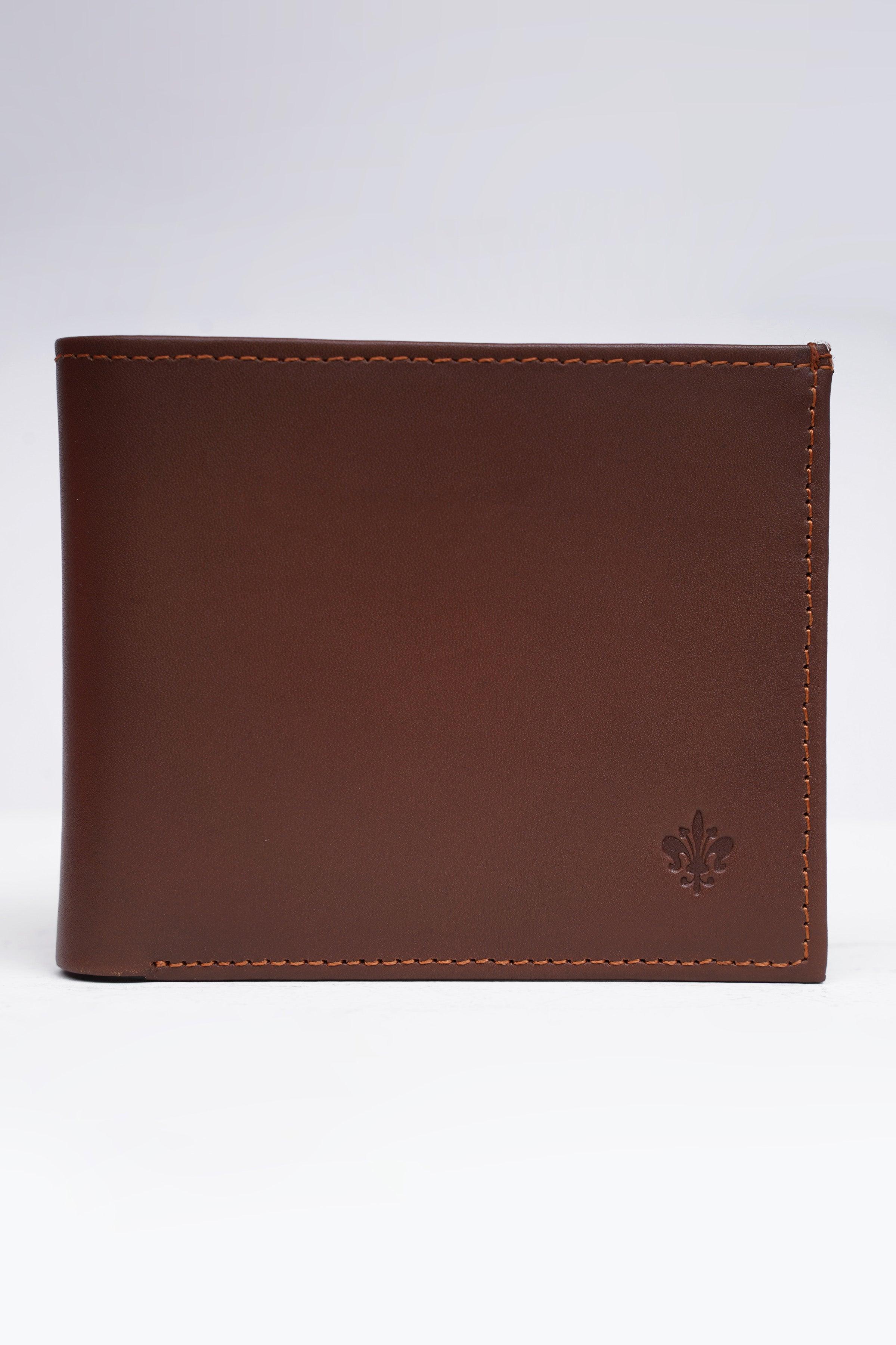 Tan leather wallet, closed front with small emblem and contrast stitching