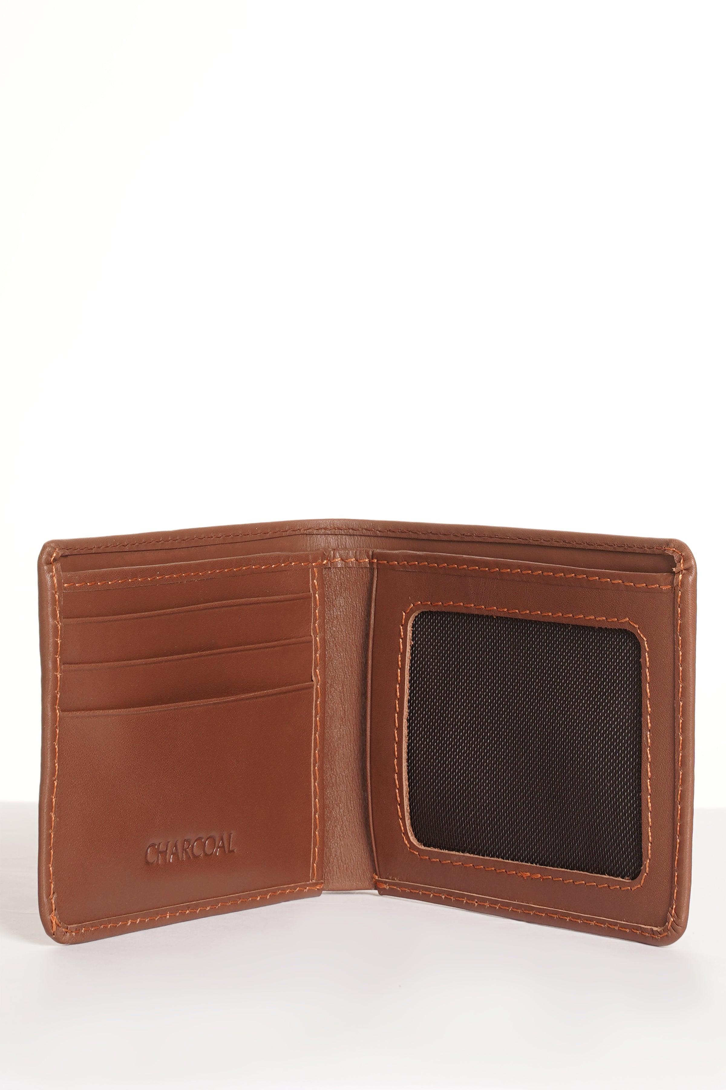 Tan bifold wallet open, showing card slots and dark coin pocket