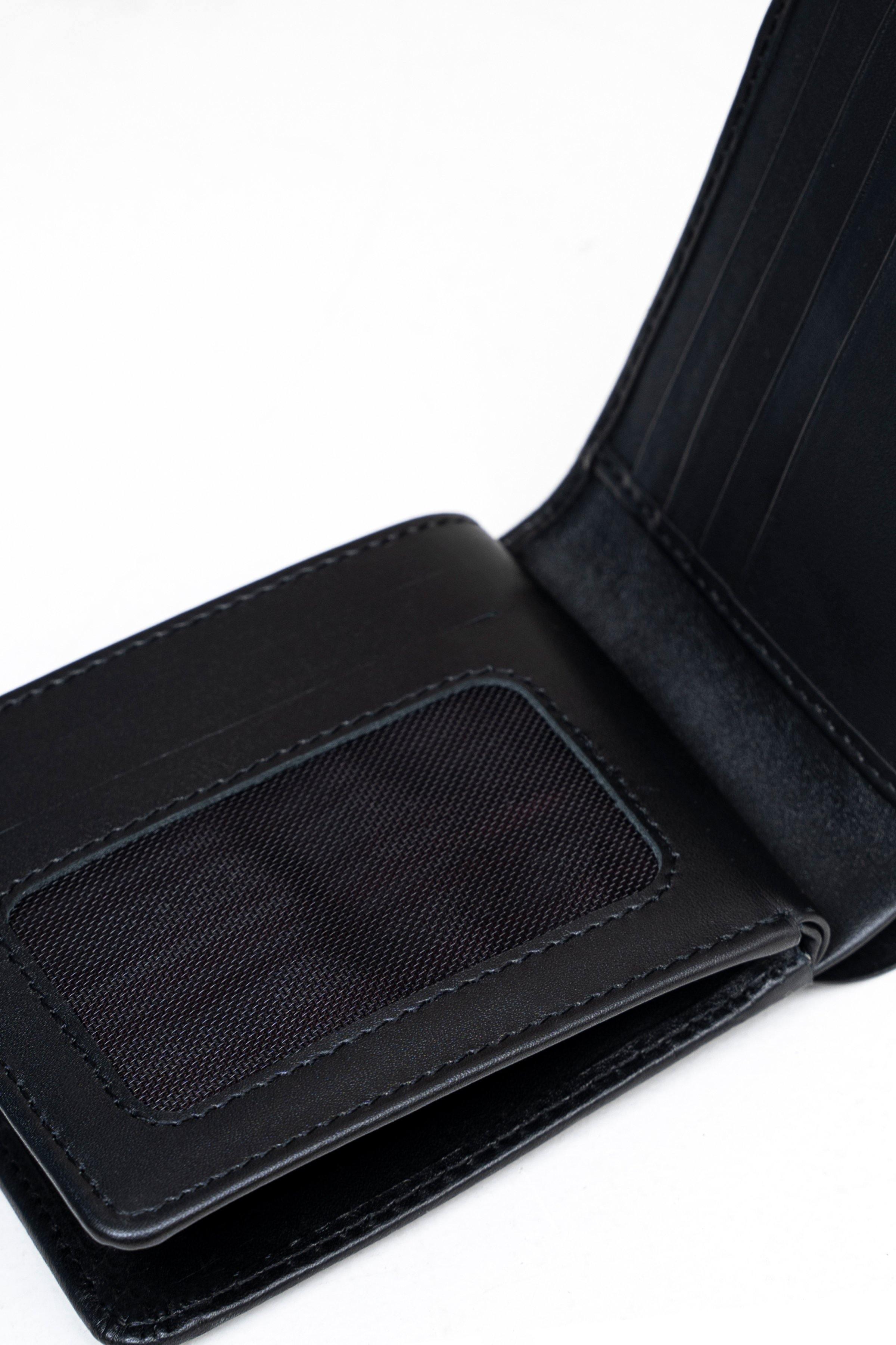 Black bifold wallet with fabric ID window and card slot compartments