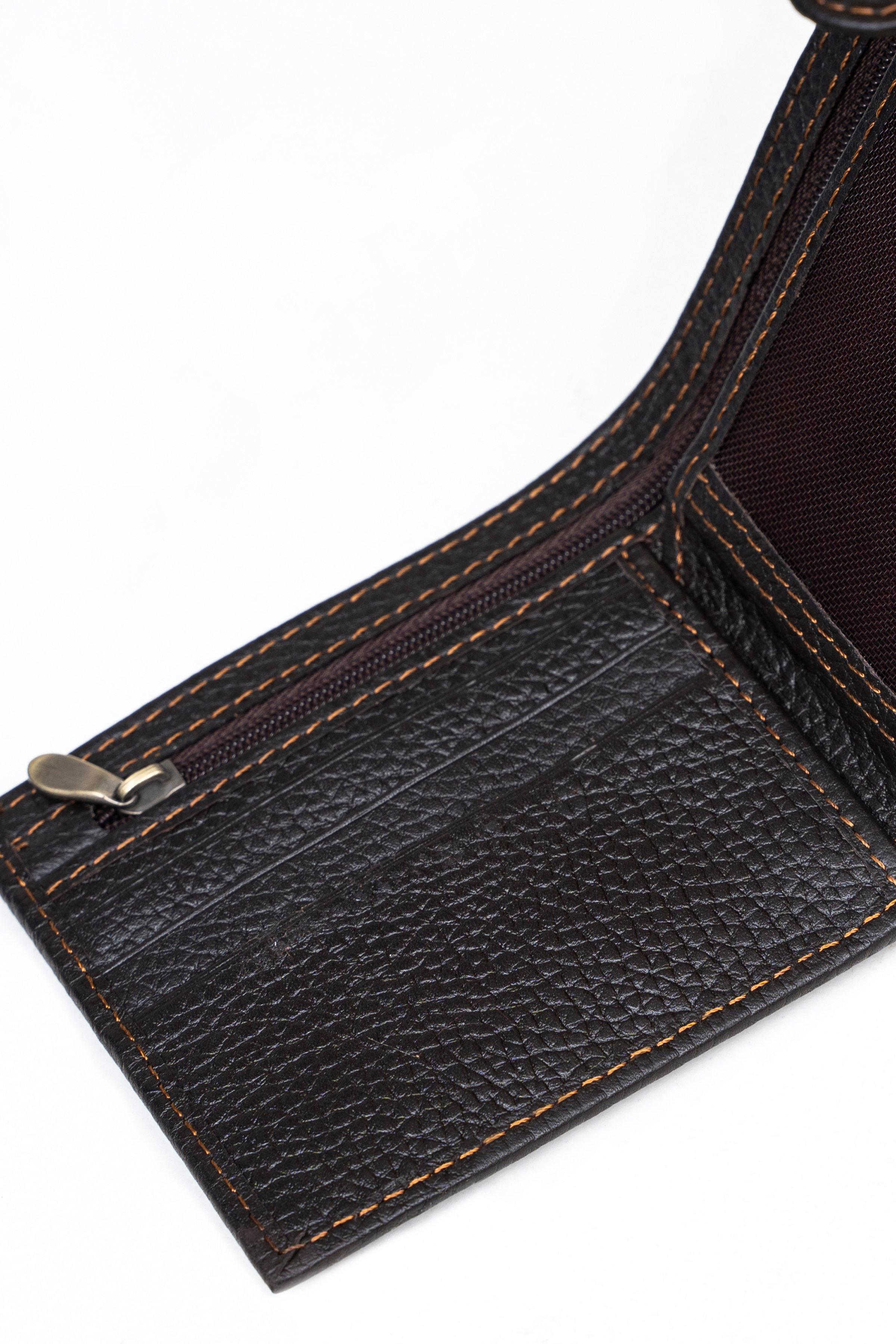 Dark leather card holder panel with textured grain and tan stitched edges