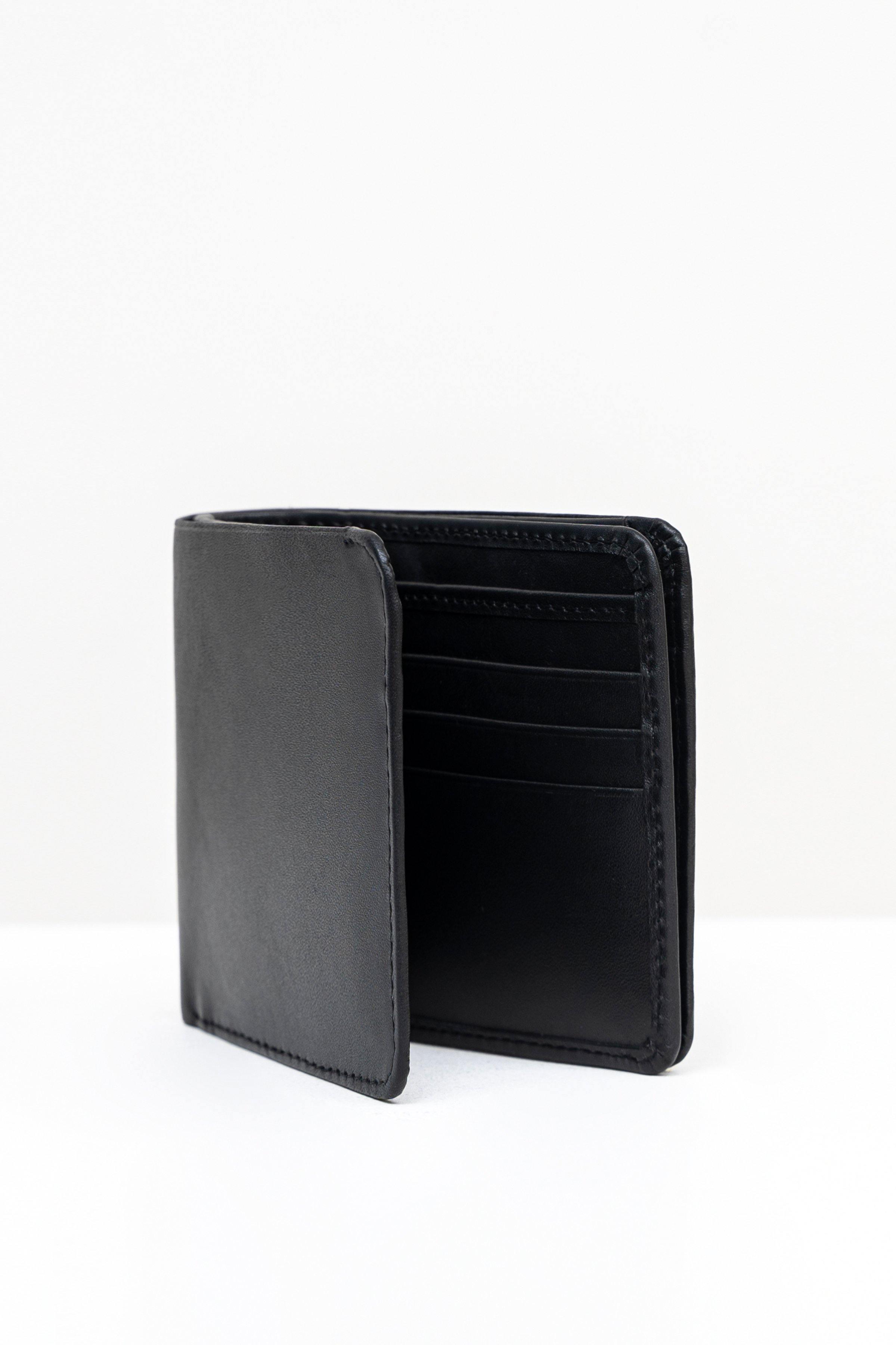 Black bifold wallet open view with card slots and interior pockets