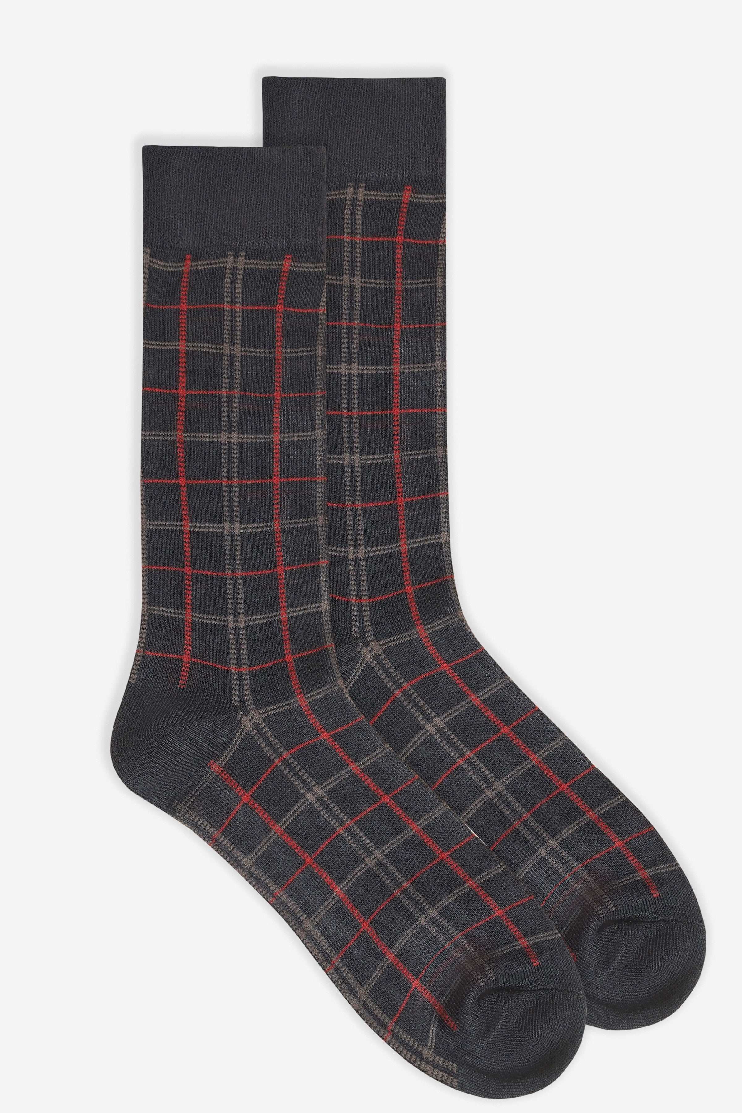 Pair of dark wool socks with red plaid grid pattern