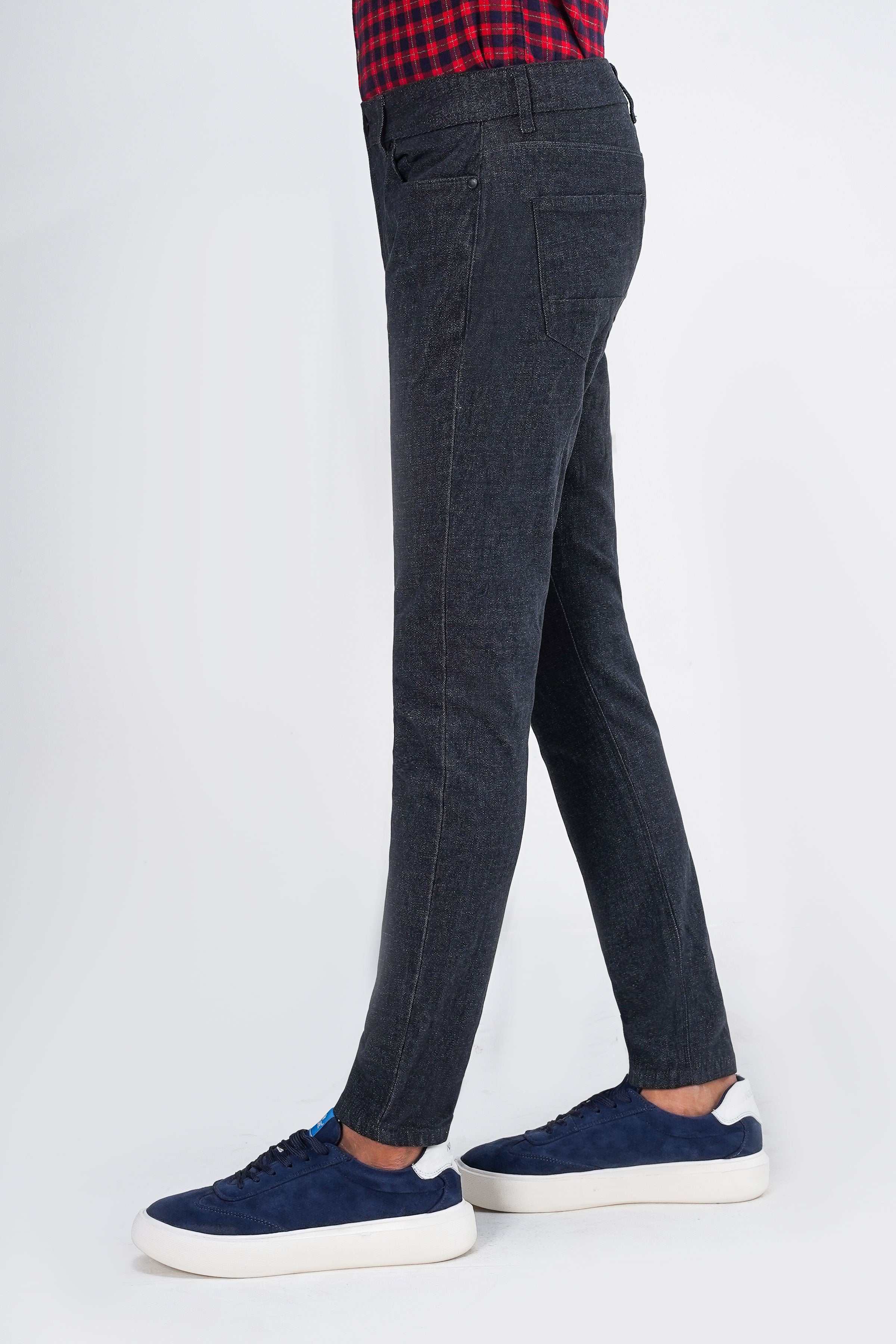 Greyish navy wool 5-pocket pant, side profile with slash pocket and tapered leg