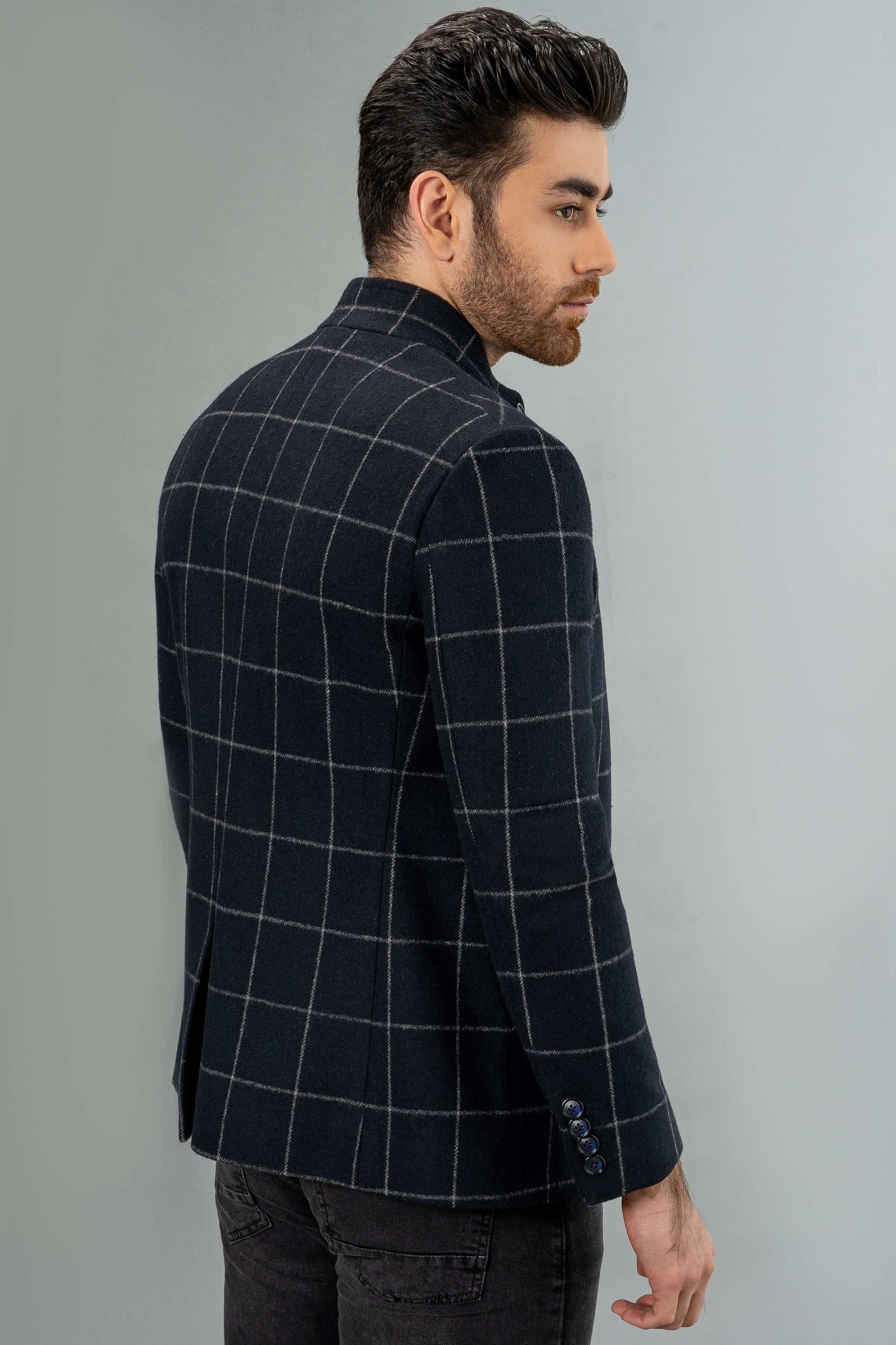 Navy checked wool casual coat in side view, button front and long sleeves