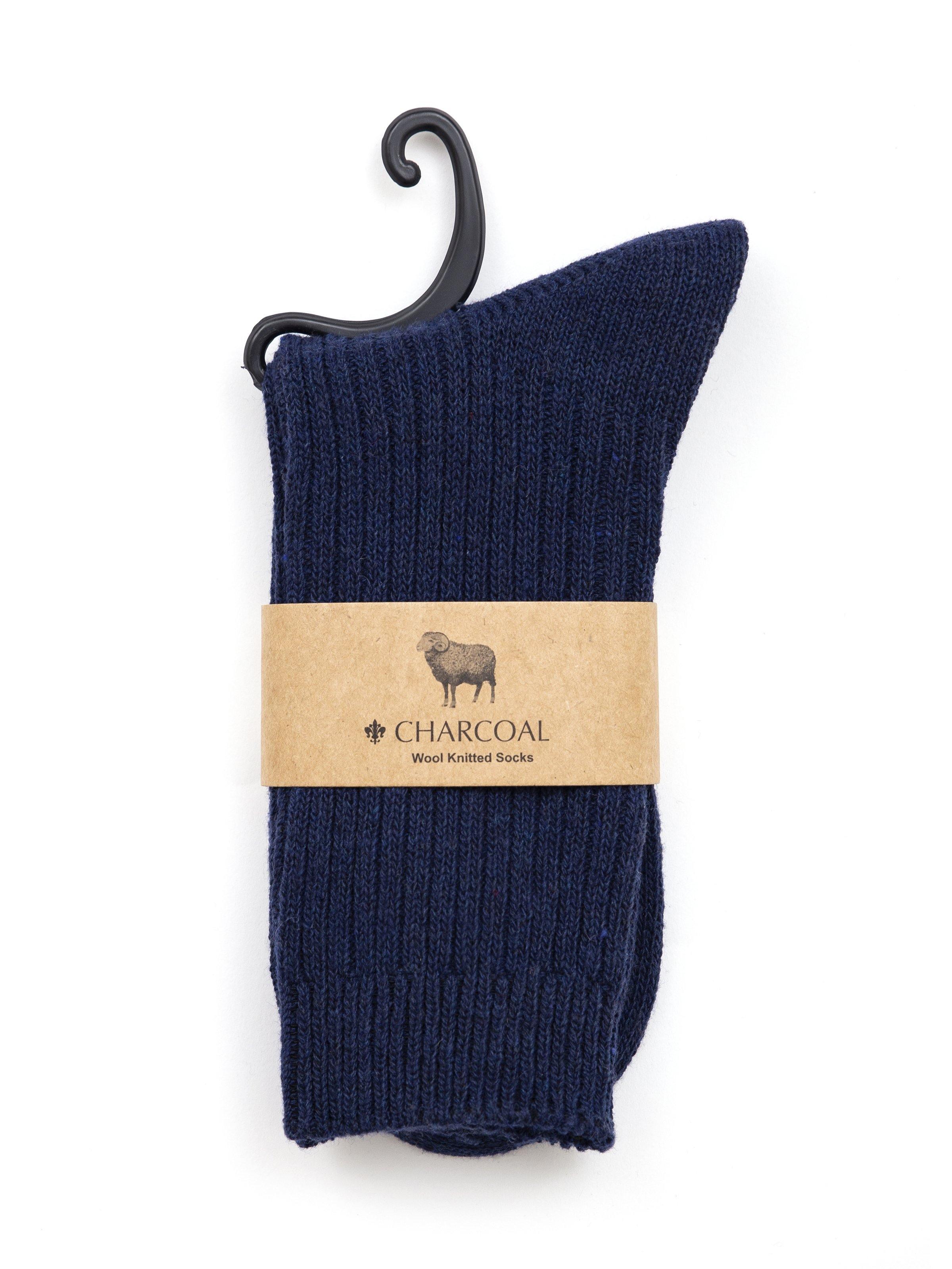 Dark blue wool crew socks with paper label and hanging loop