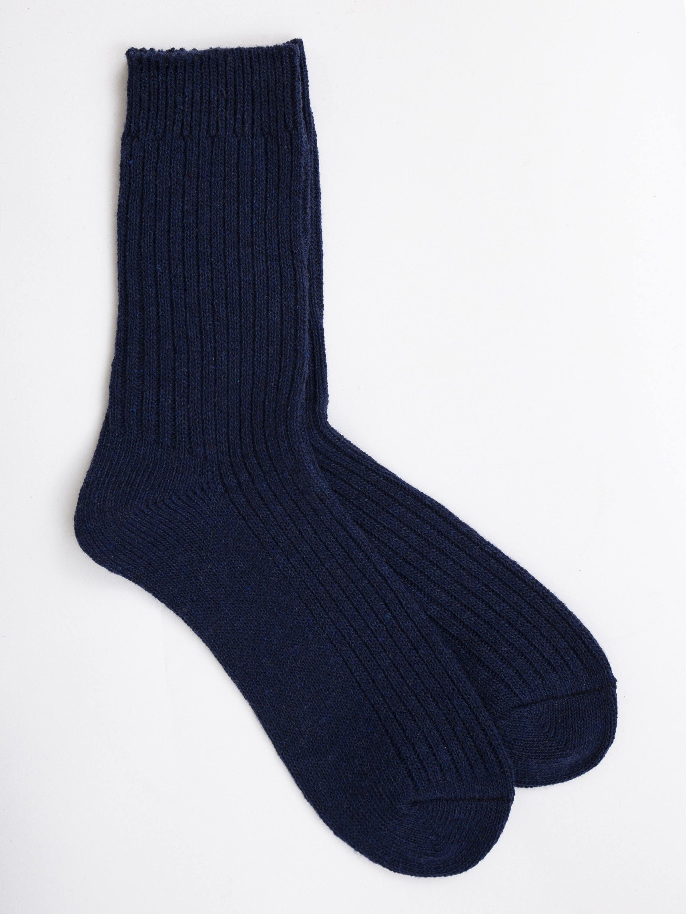 Dark blue wool crew sock with ribbed knit and folded cuff