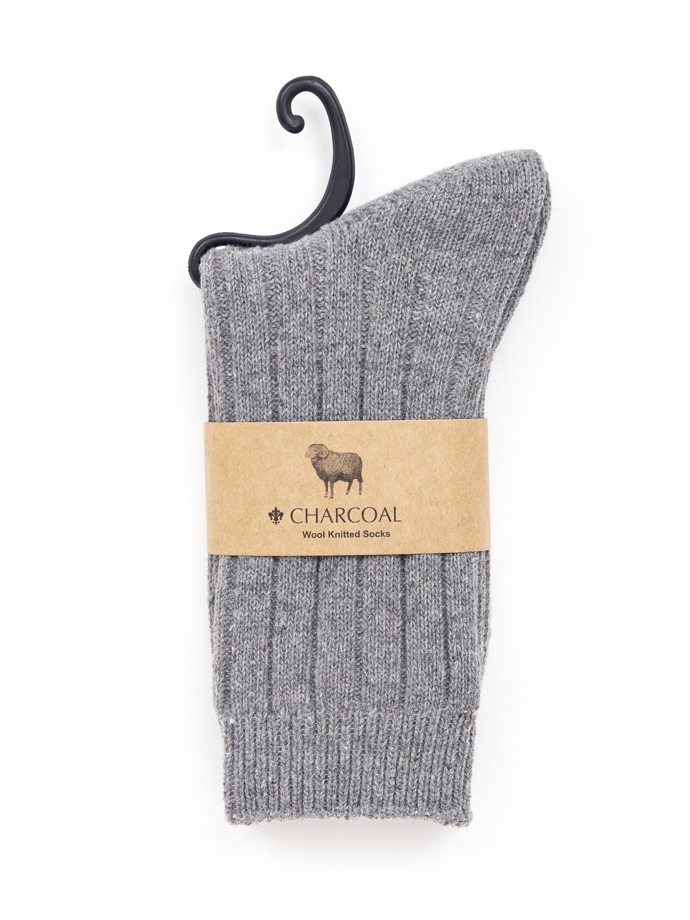 Charcoal gray wool socks on hanger with ribbed knit texture