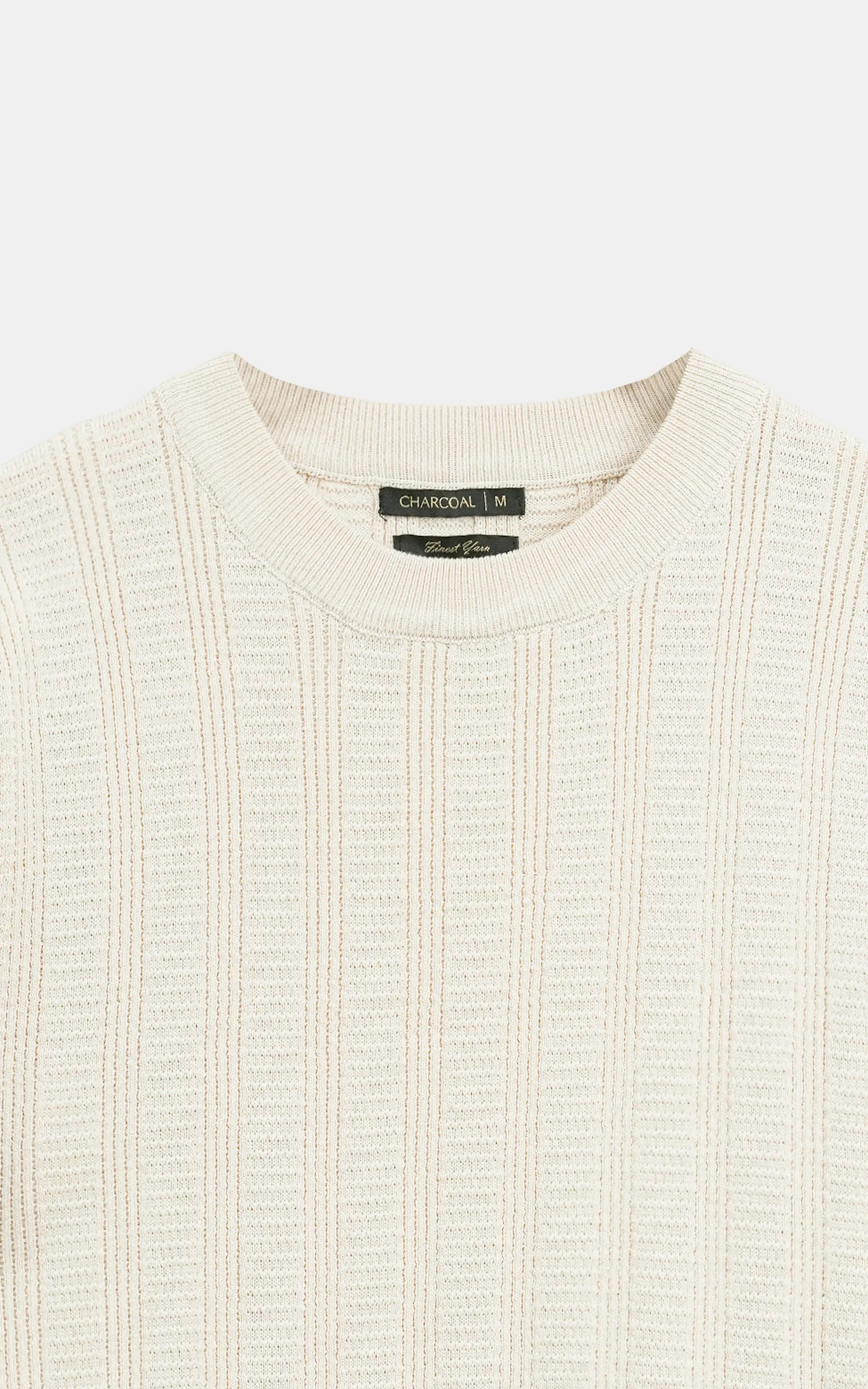 Beige cable-knit crew neck T-shirt collar, knit texture with interior tag.
