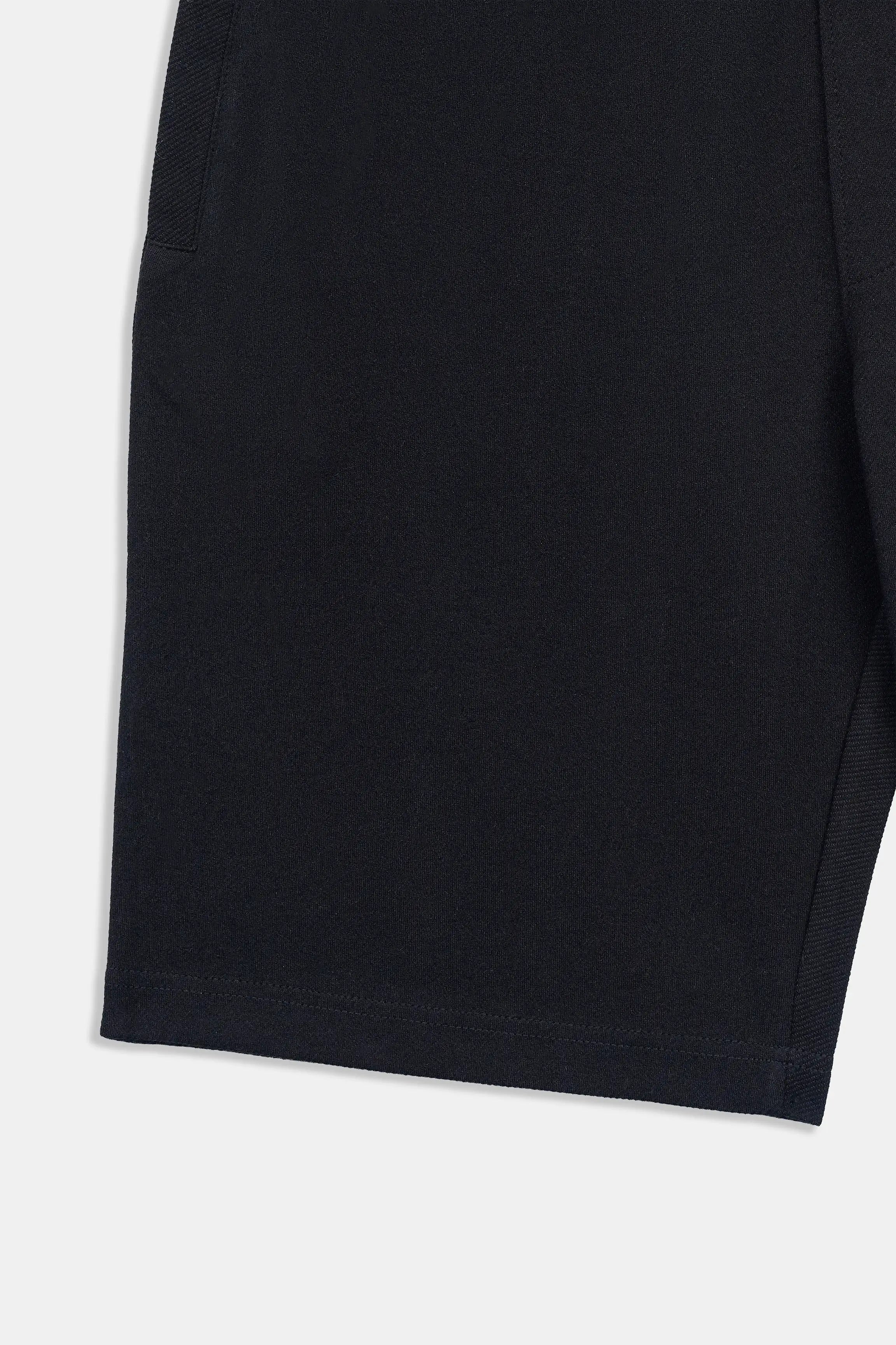 Black regular-fit shorts with clean straight hem, mid-thigh length