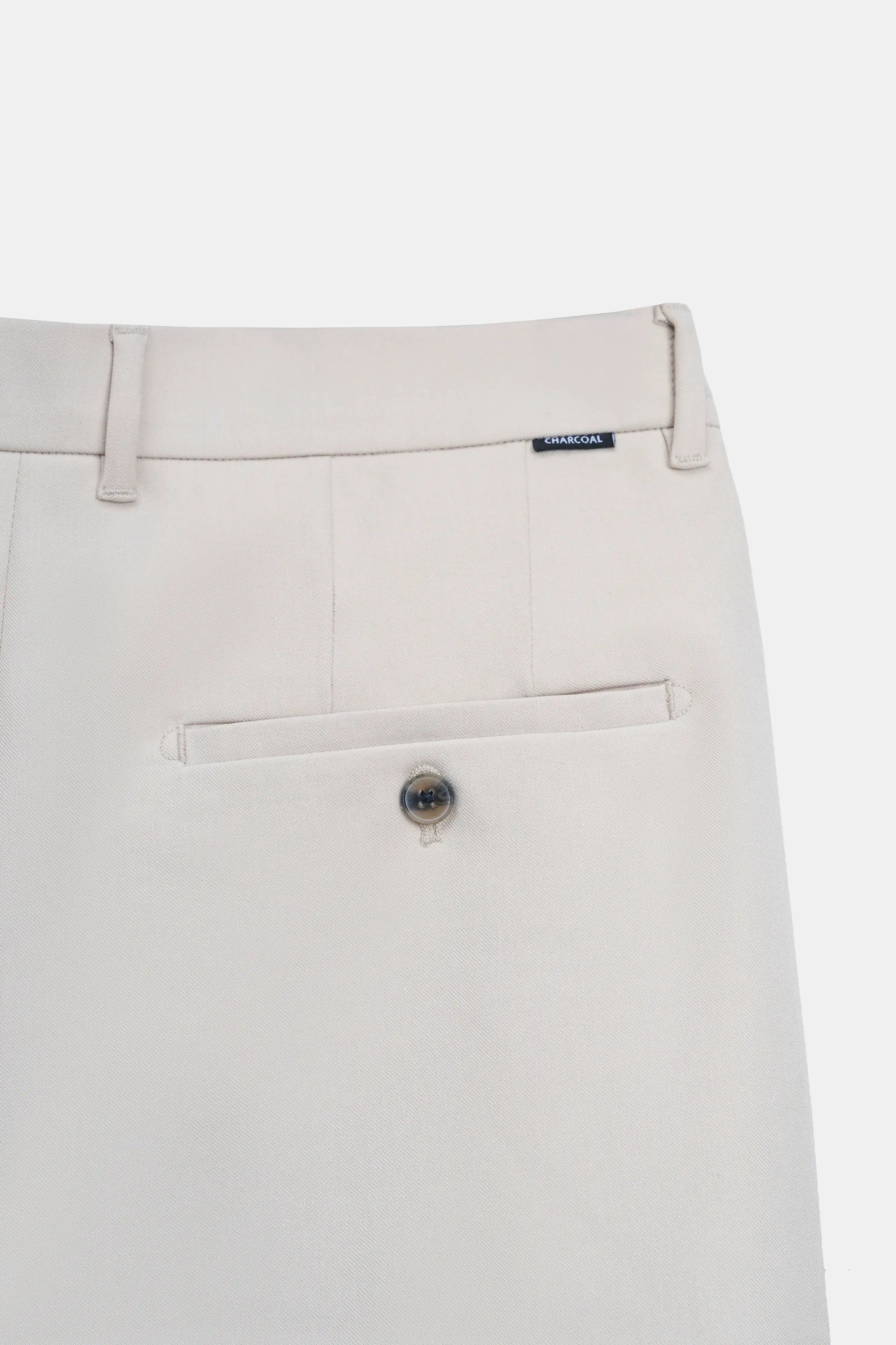 Beige casual pants fly front with button closure and belt loops detail