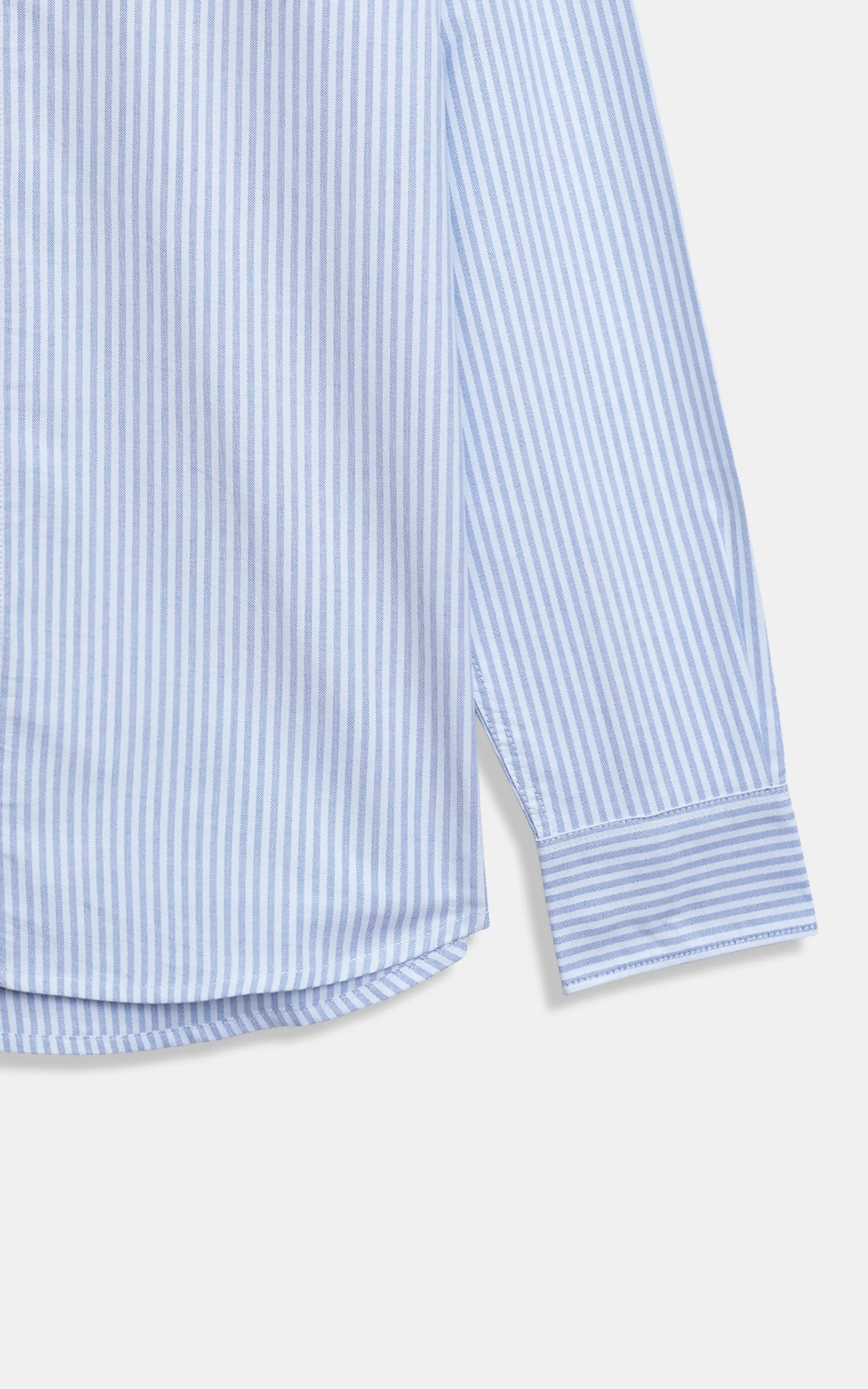 Men's light blue striped shirt sleeve cuff with light stripe detail
