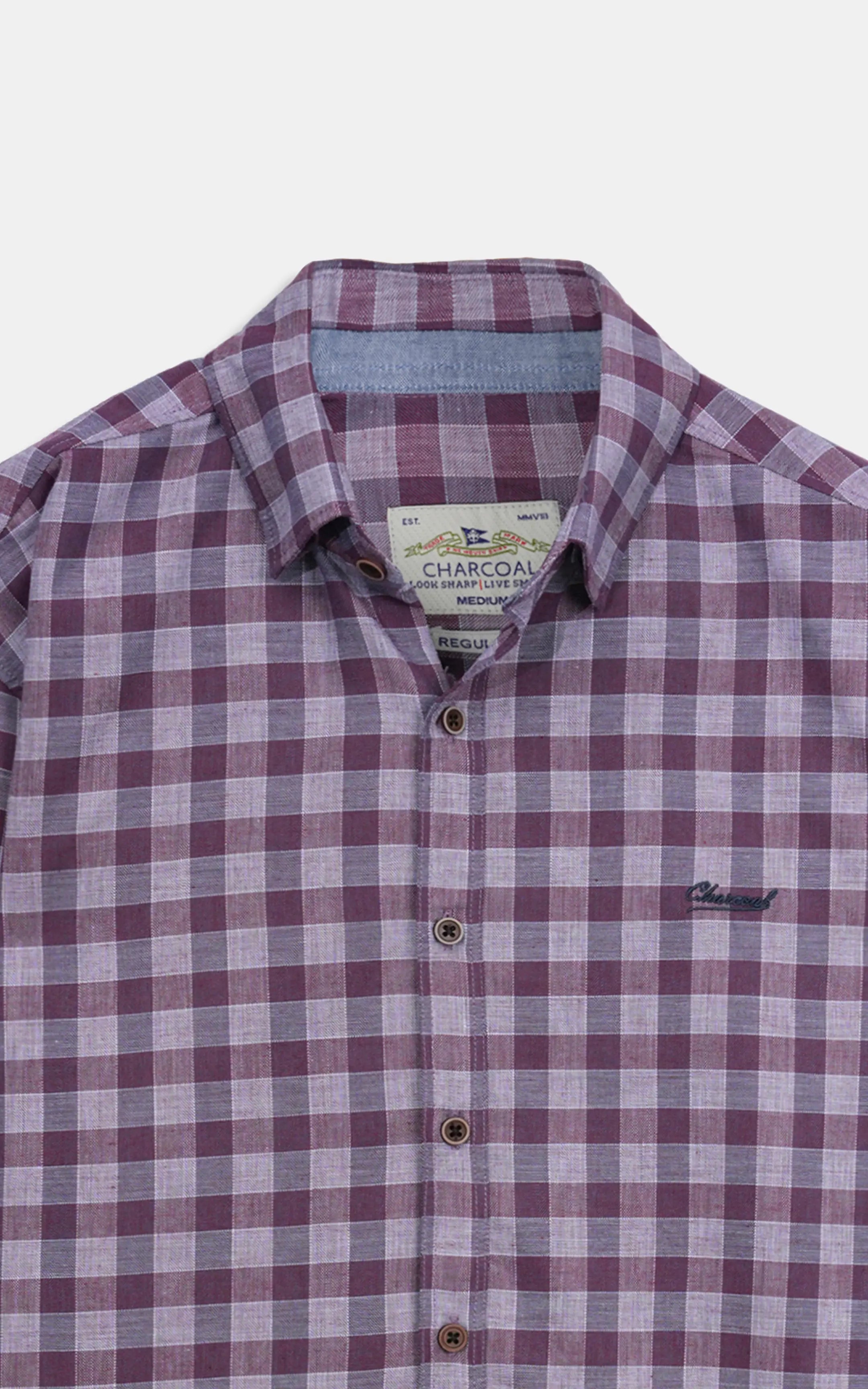 Burgundy checkered button-down shirt collar and button placket detail