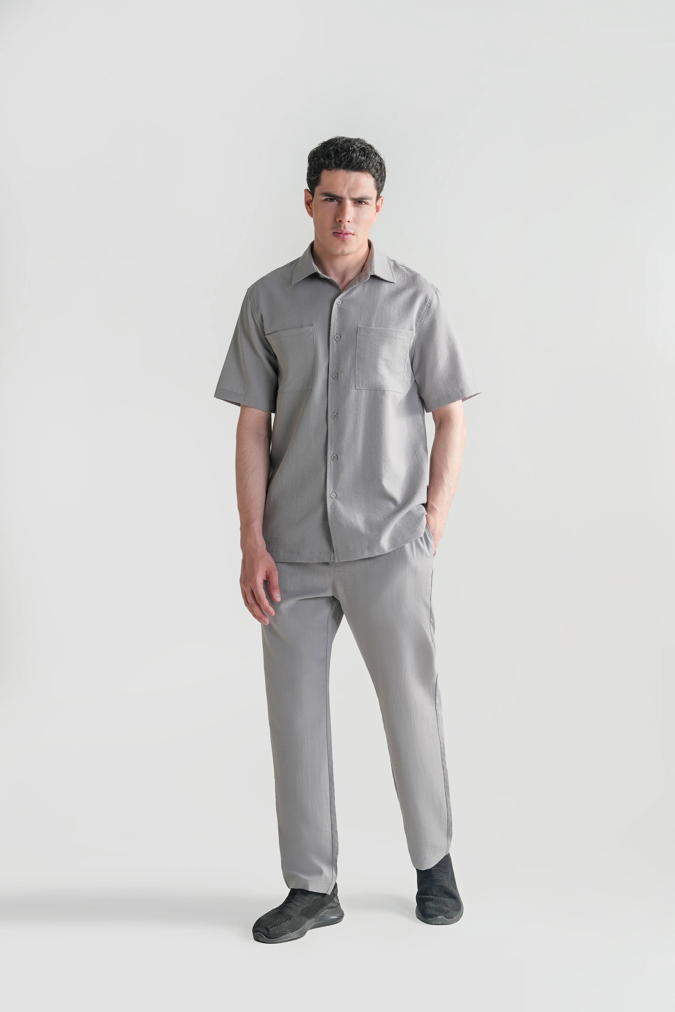 Light grey casual short-sleeve shirt with regular collar and chest pockets