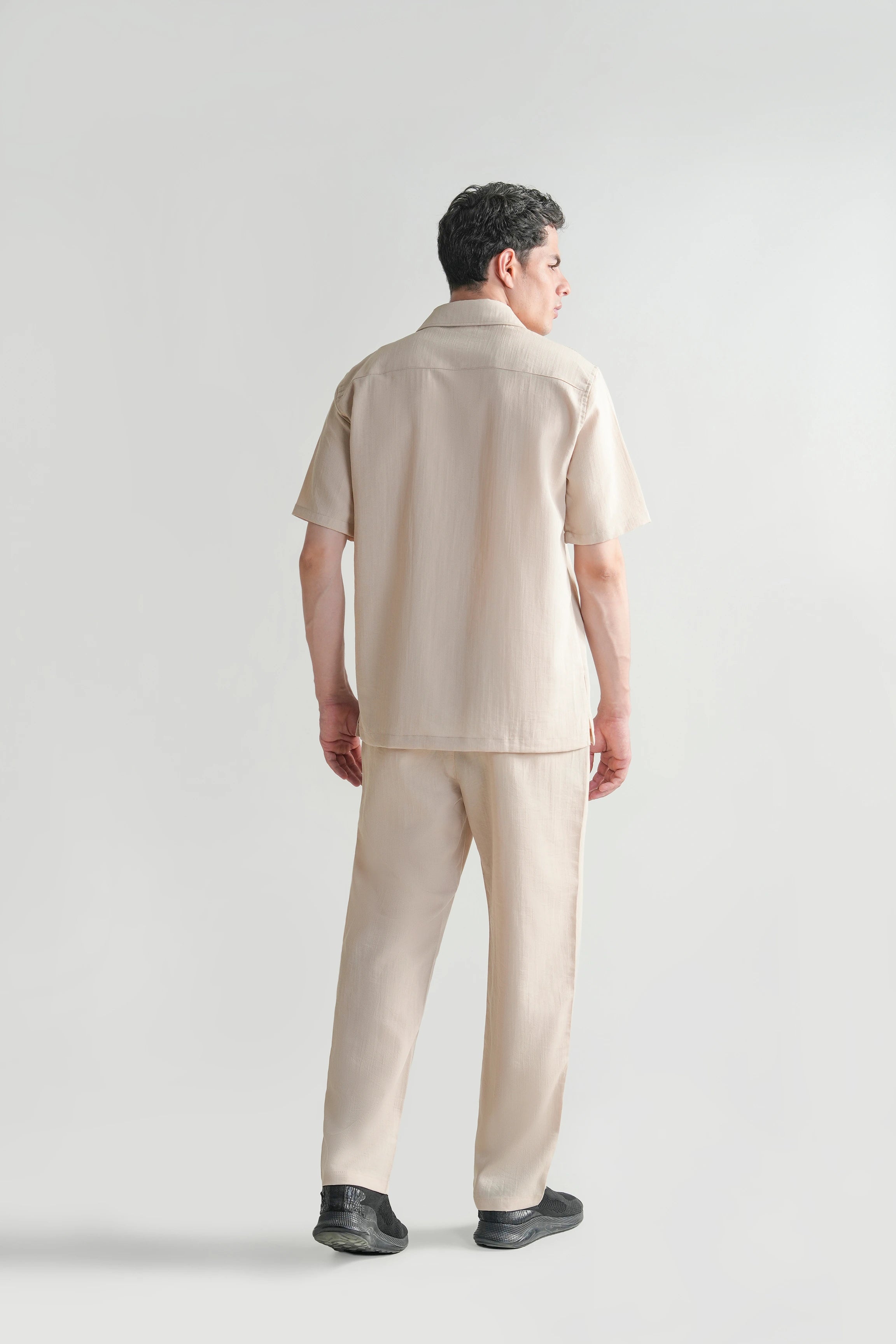 Beige short-sleeve casual shirt with regular collar, back view