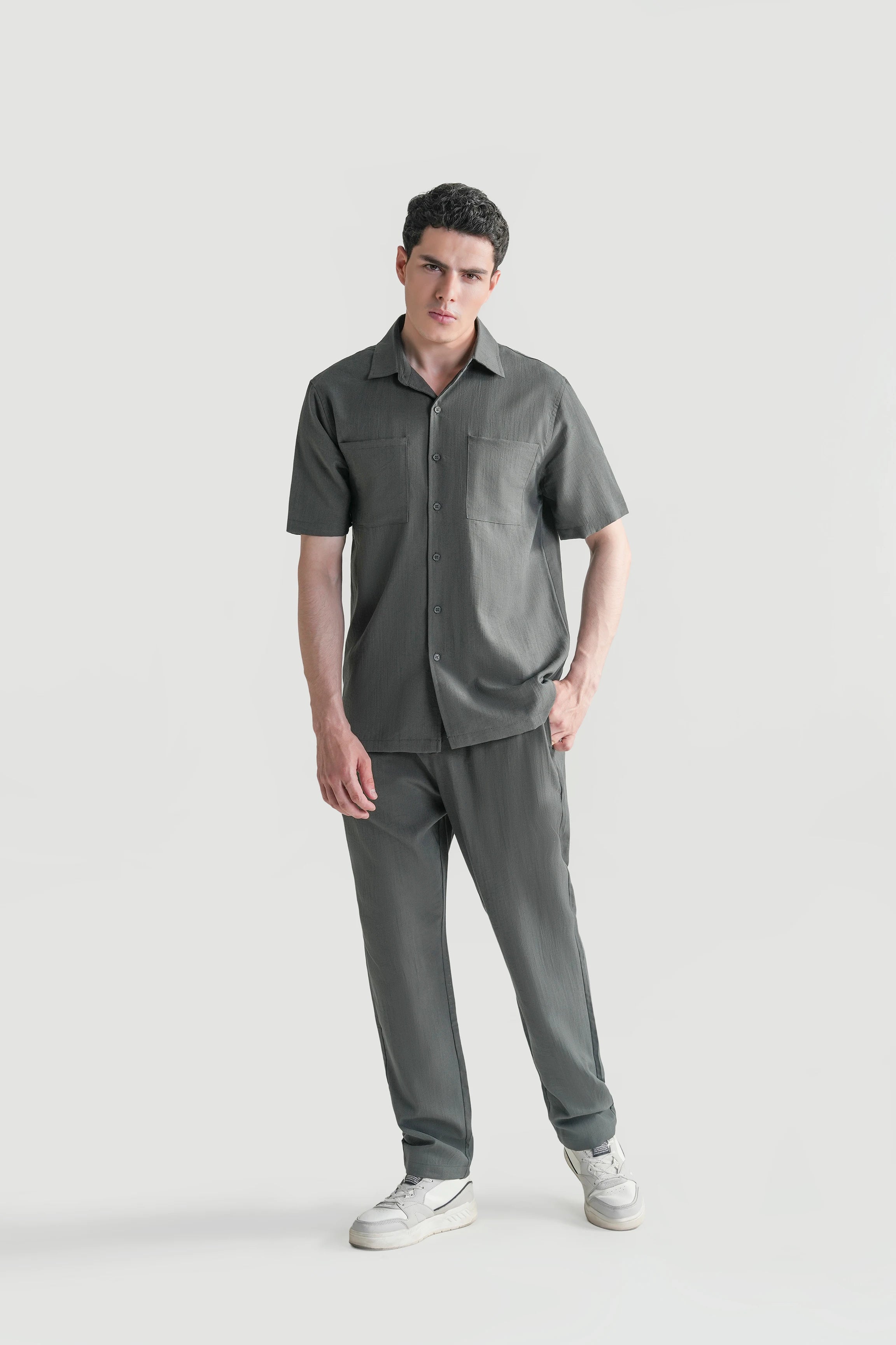 Dark grey casual short-sleeve shirt with regular collar and chest pockets