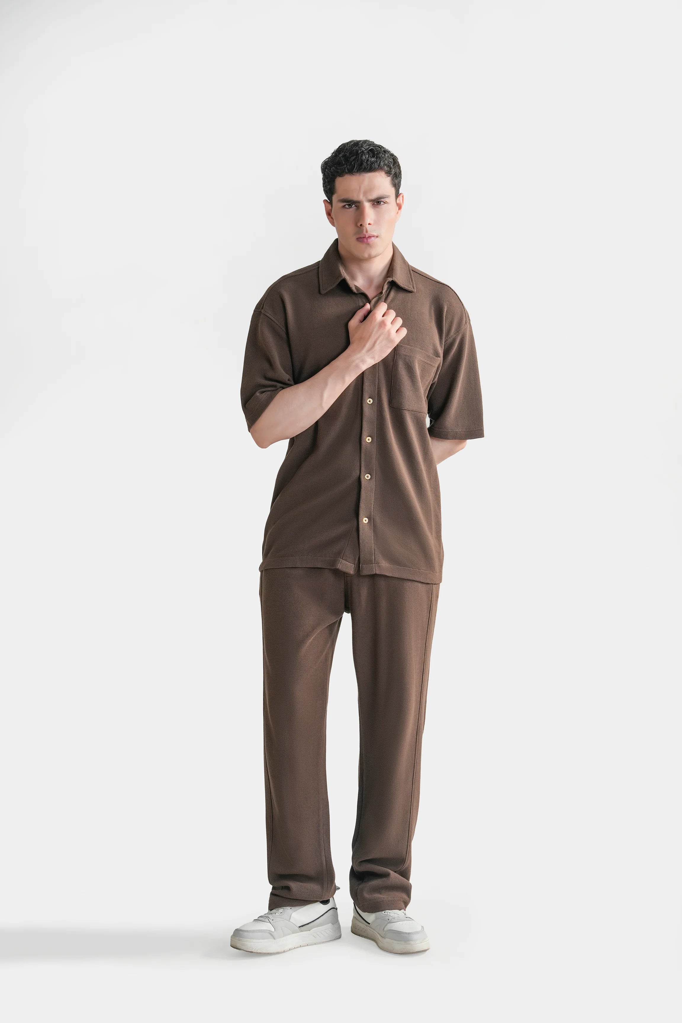 Brown knit casual shirt with spread collar and button-front, short sleeves