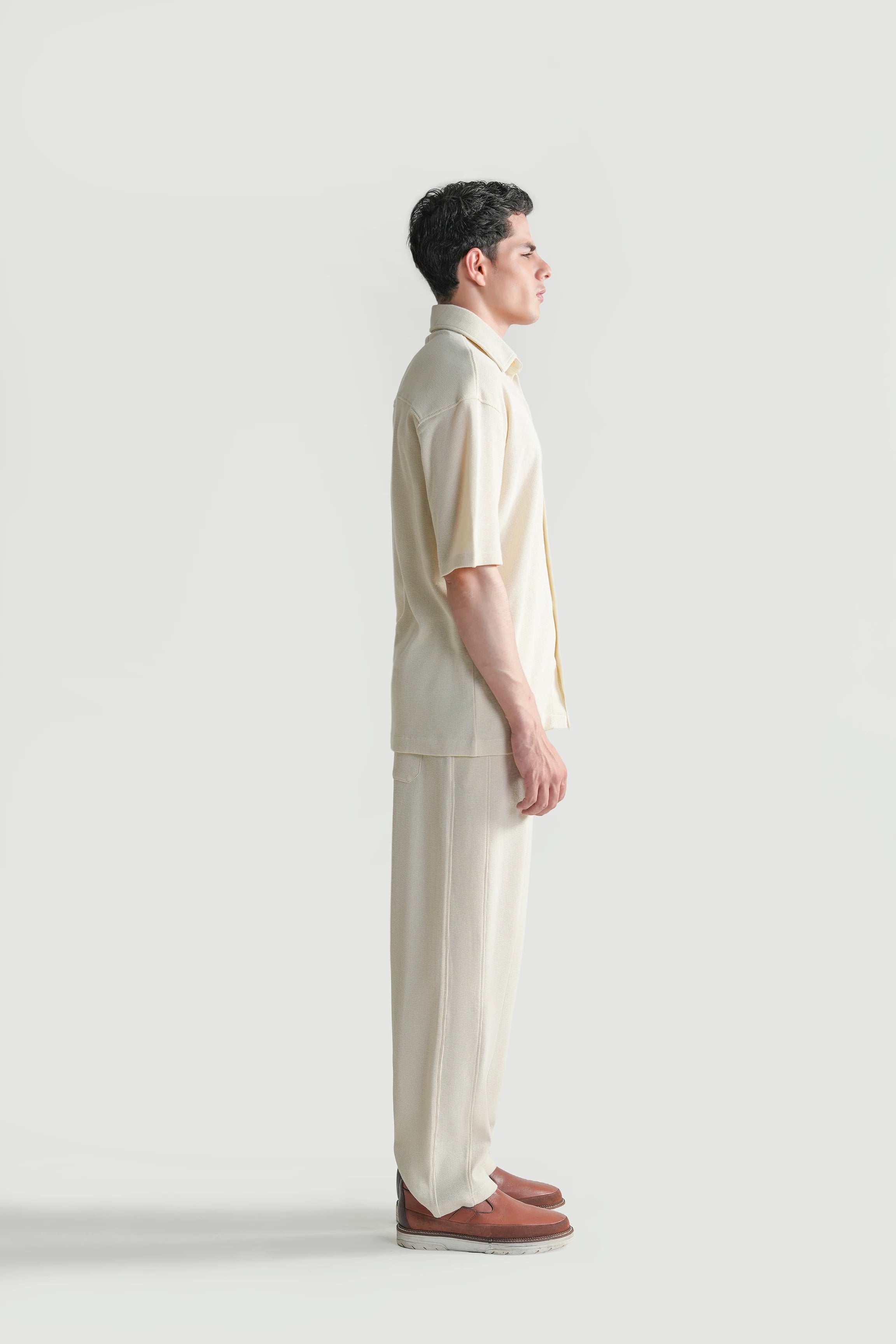 Off-white knit casual shirt, side view with short sleeves and button-front