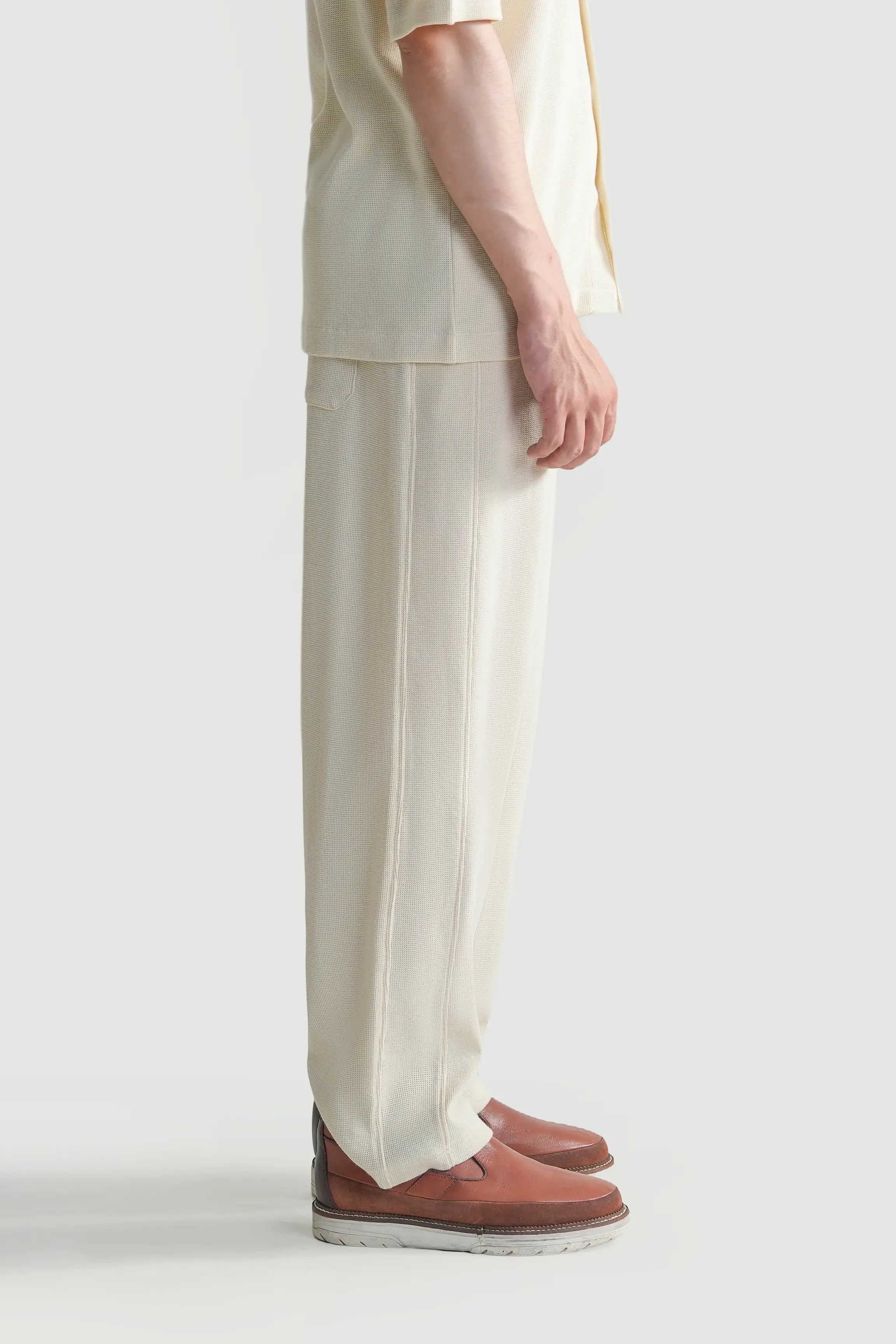Off-white knit trousers, side seam and relaxed leg