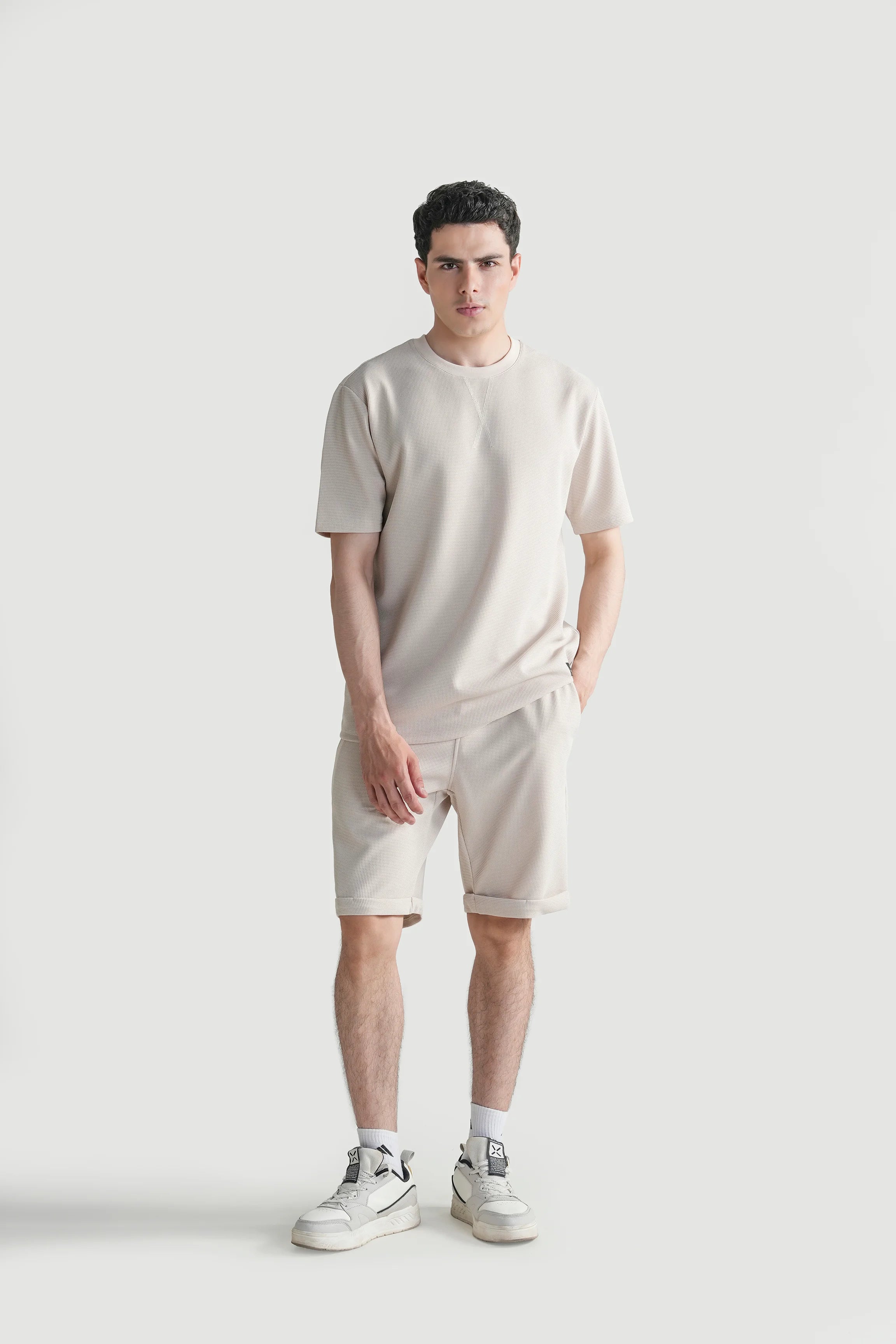 Beige oversized crew neck T-shirt with relaxed short sleeves