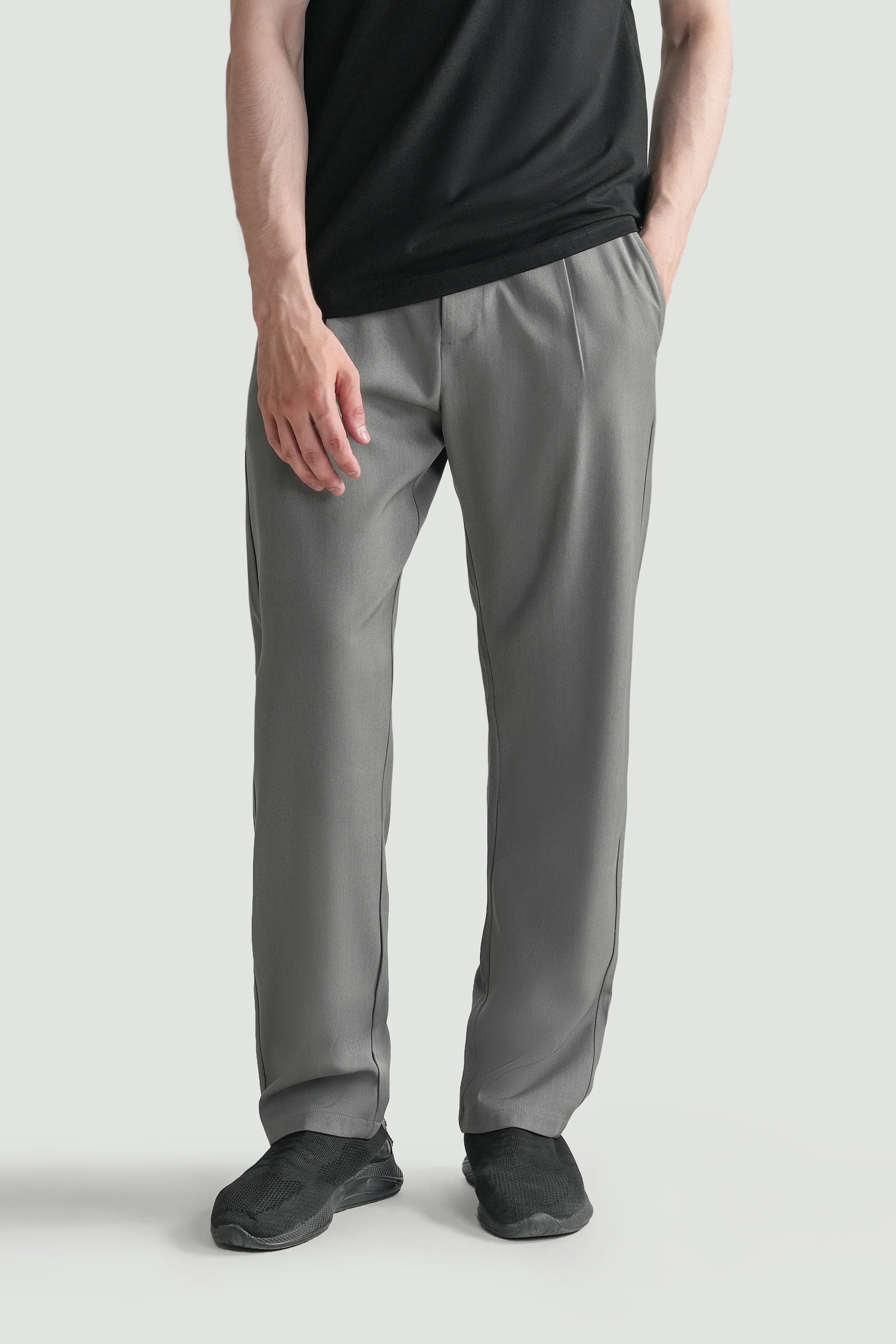 Grey straight-fit casual pants with side seams and cuffed hems