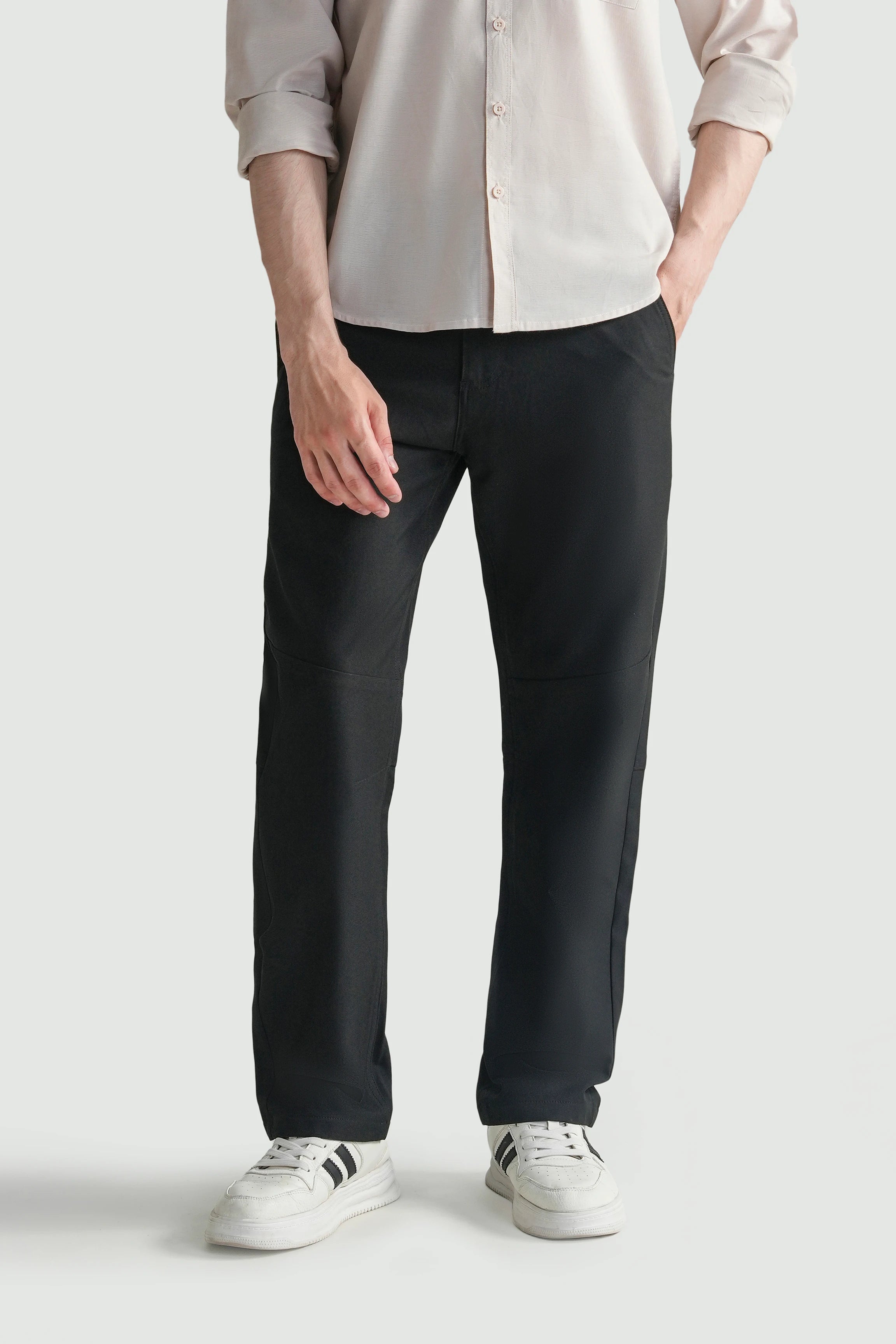 Black straight-fit travel pants with slim straight leg and front hand pockets, belt loops