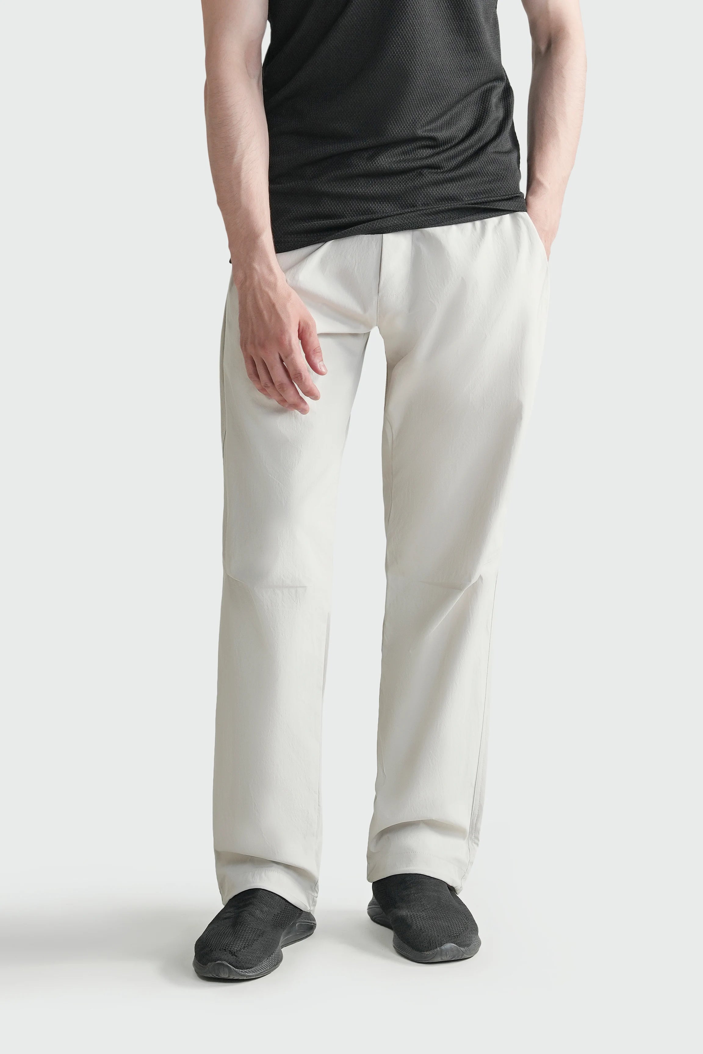 Stone loose-fit casual trousers with elastic waist and full-length straight legs