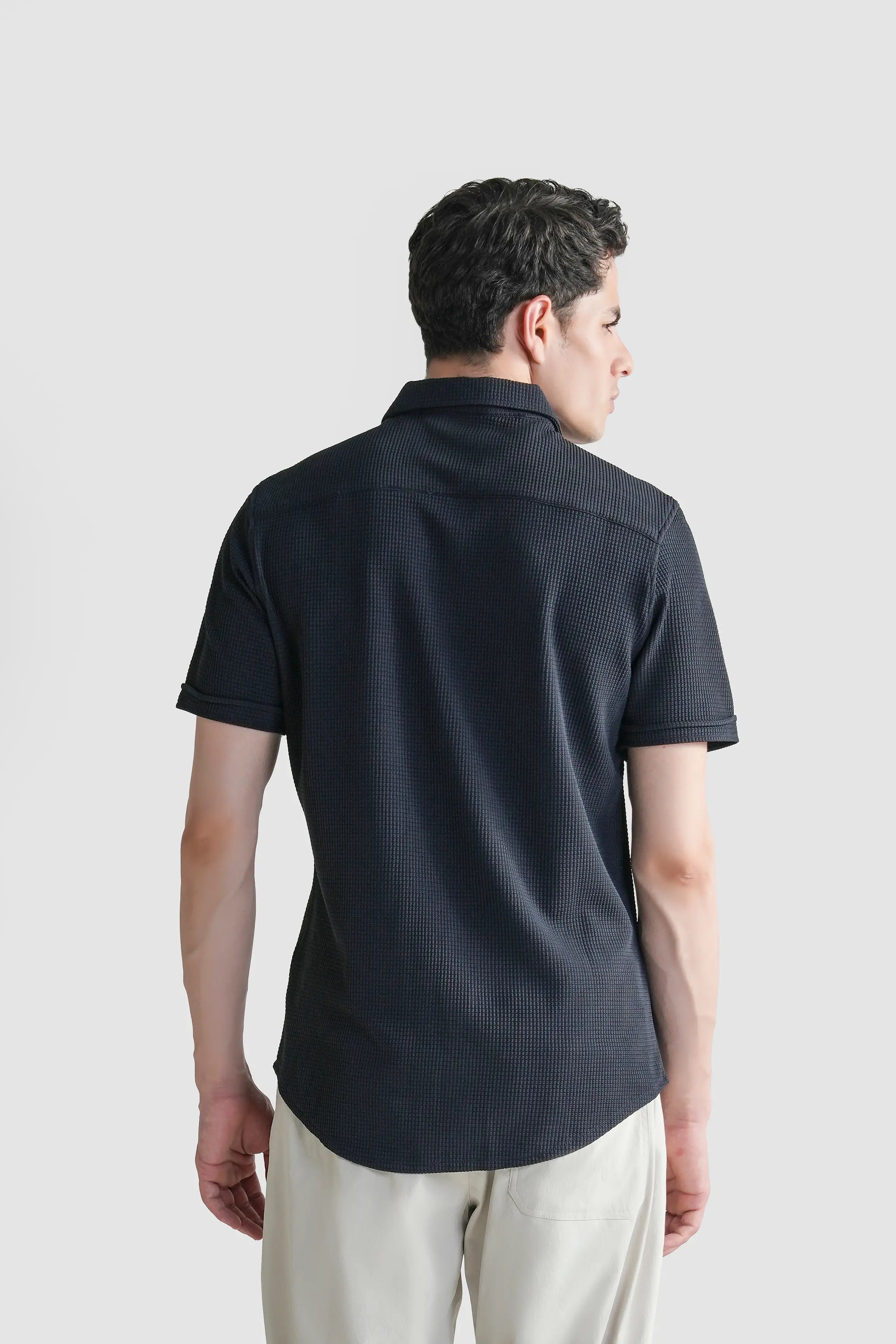 Navy self-textured casual shirt, back view with short sleeves and high collar