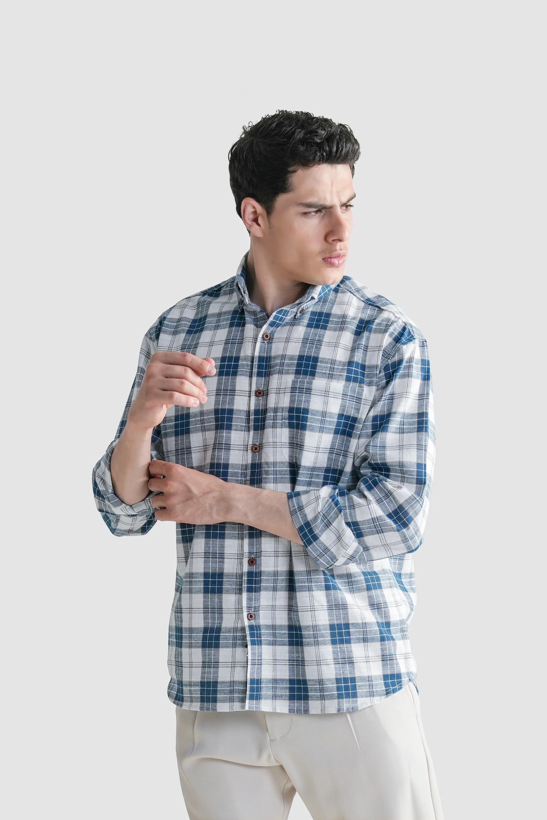 Blue and white plaid button-up shirt, front view with sleeves and chest placket