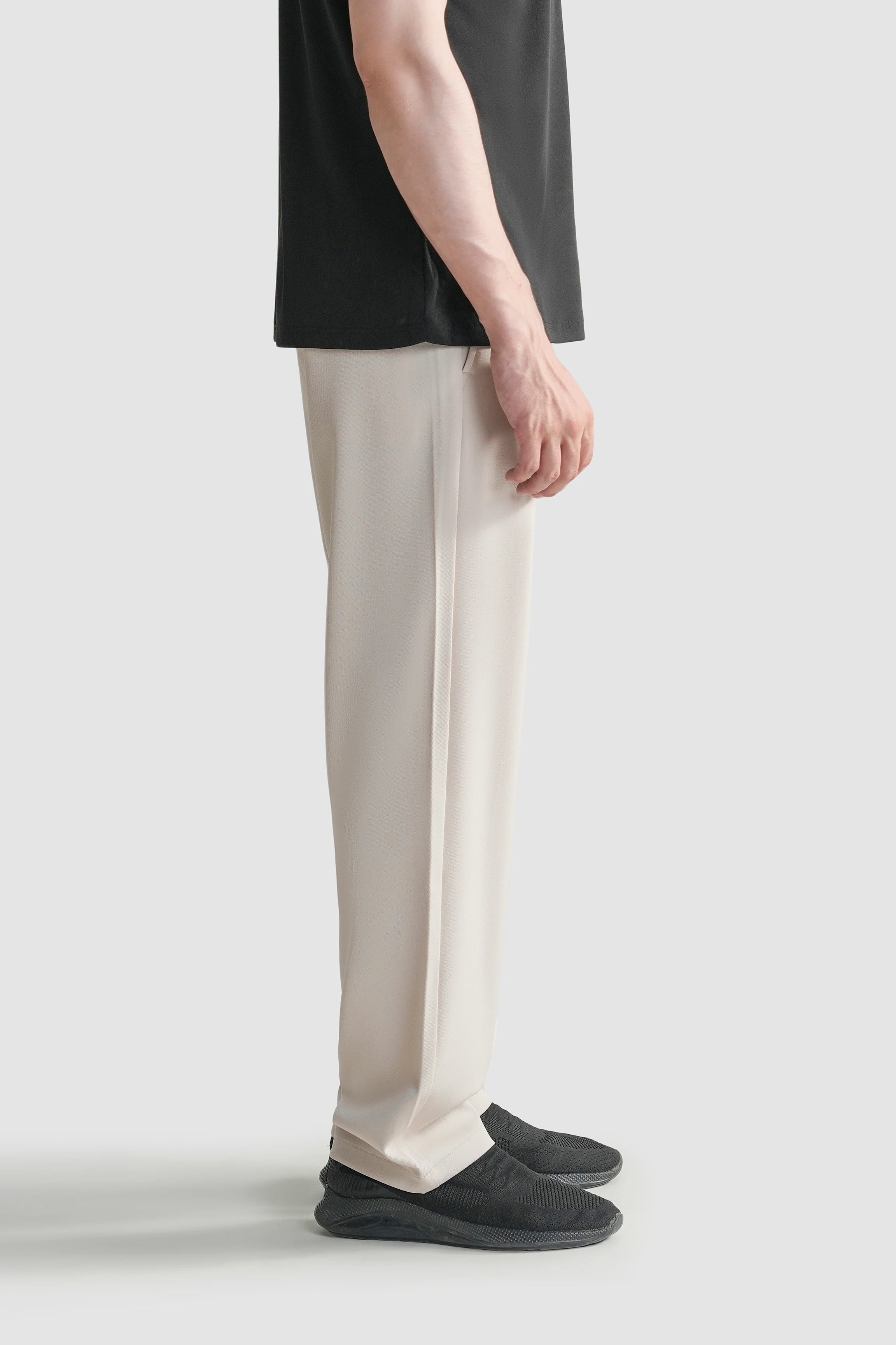 Beige straight-fit casual pants with straight leg and clean ankle hem